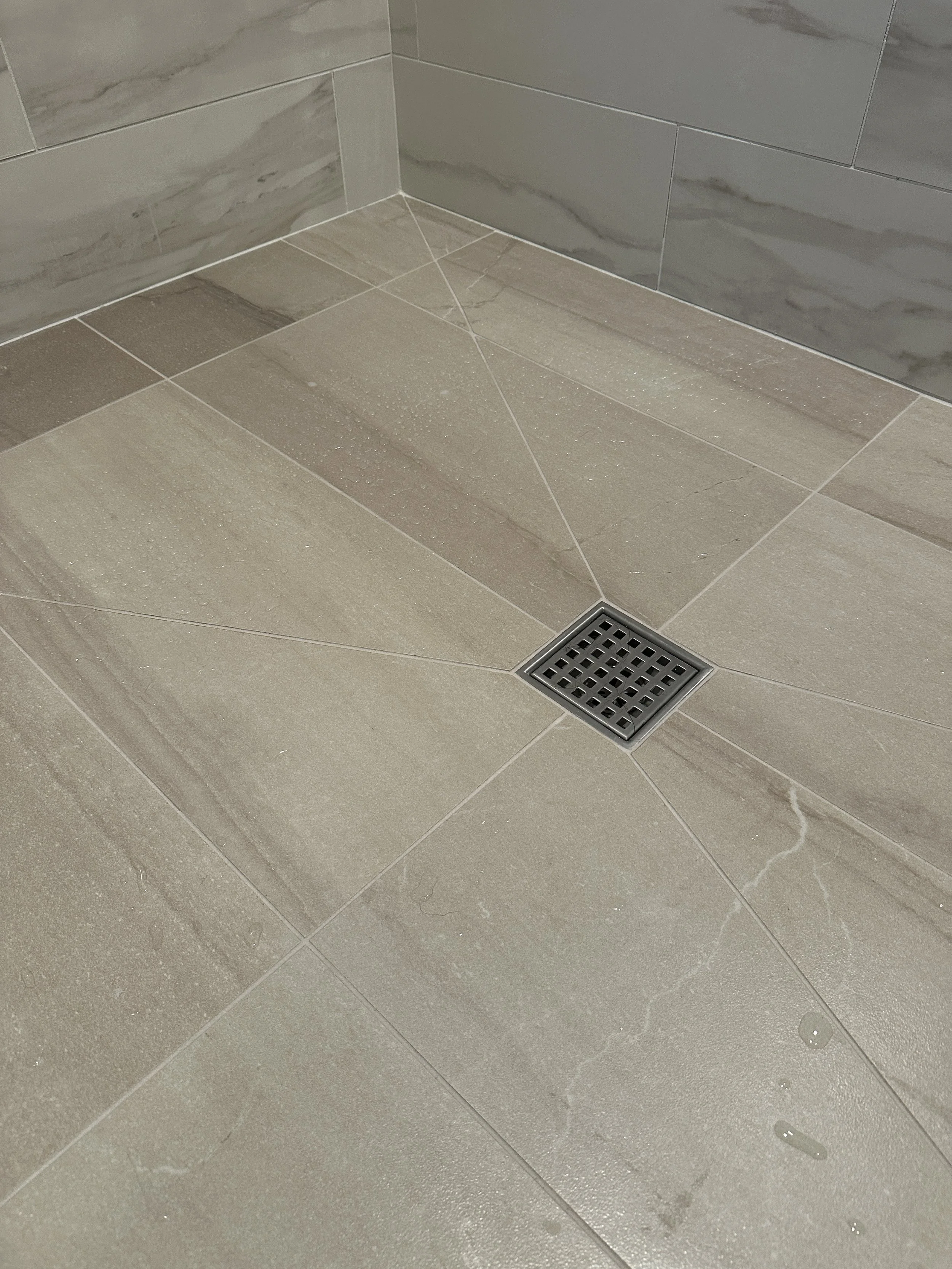 Completed Mercer Island Walk-In Shower Floor After Remodel – Epoxy Grout &amp; Precise Slope by Baklinski Home Improvement