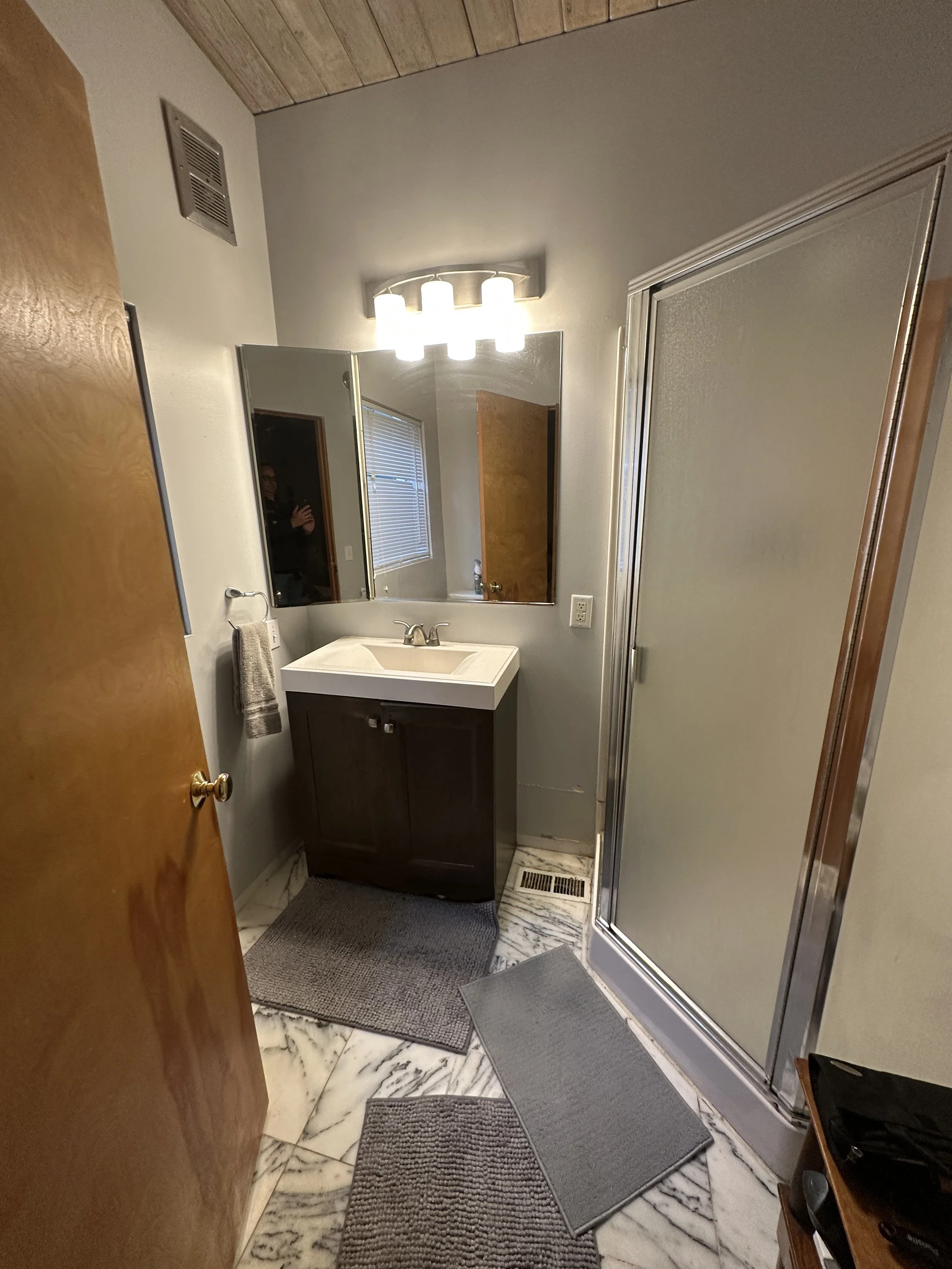 Before photo of dated bathroom