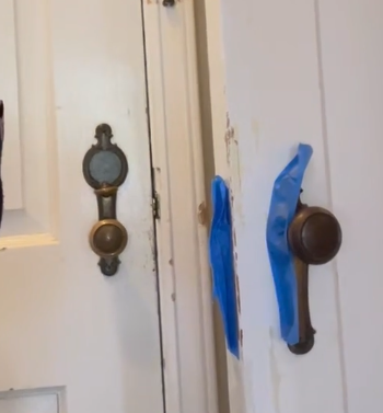 Expert handyman fixing vintage door hardware in Seattle