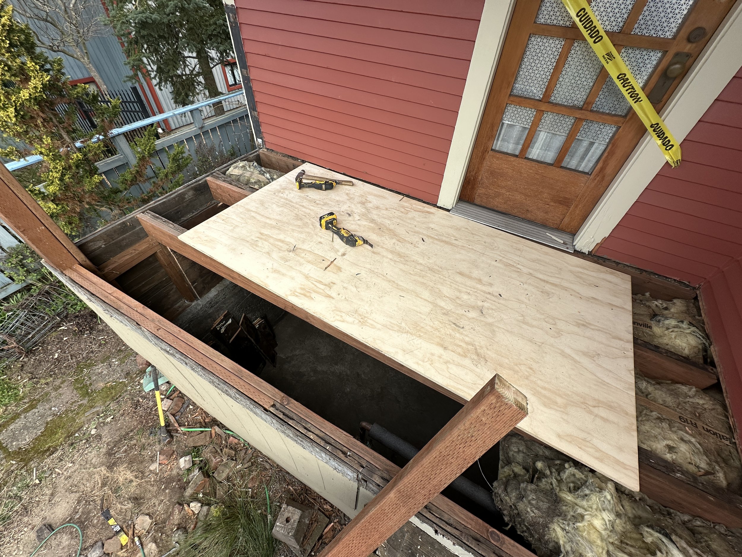 Deck reframing with new pressure-treated lumber Seattle deck repair project