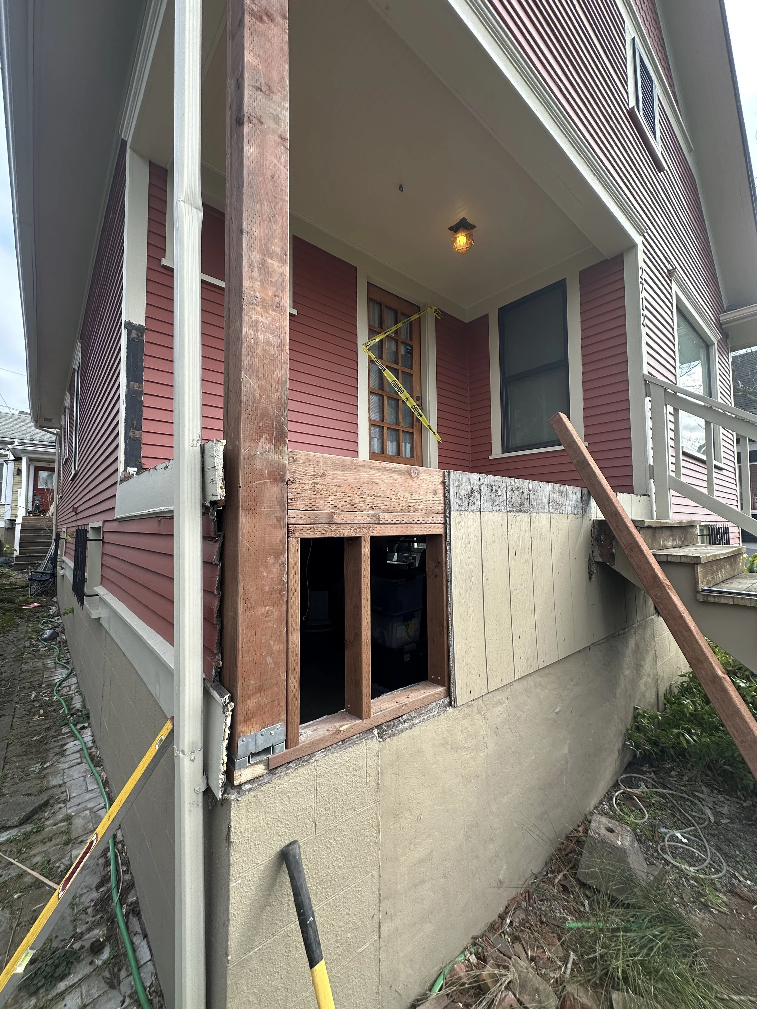 Deck reframing with new pressure-treated lumber Seattle deck repair project