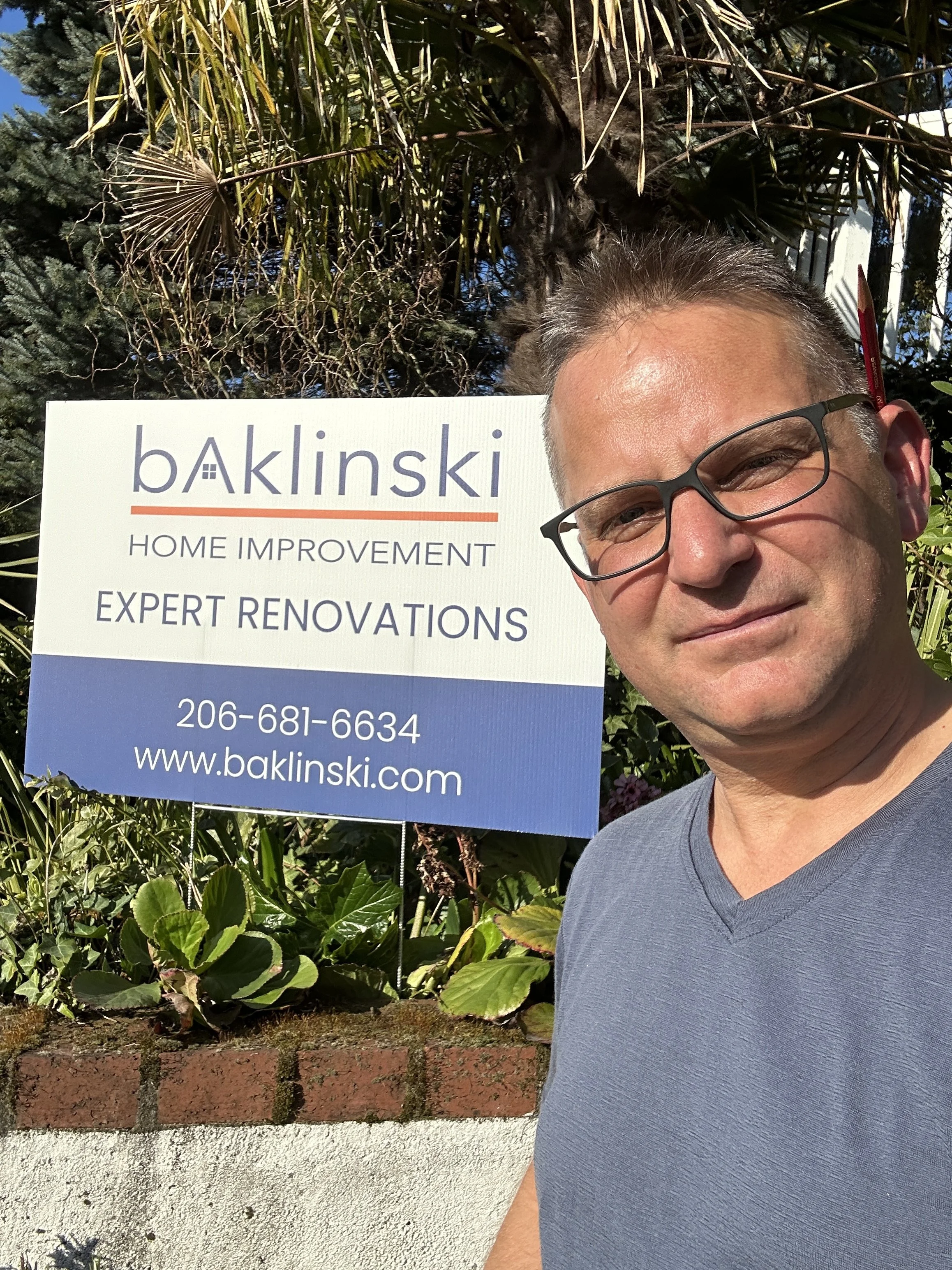 Baklinski Home Improvement yard sign in Seattle neighborhood after successful handyman project