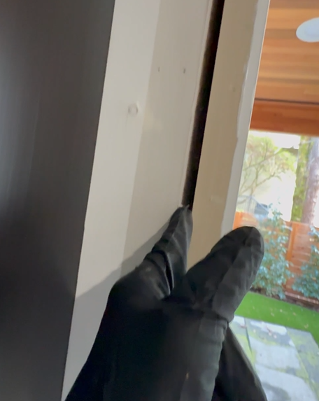 Drafty exterior door gap Seattle repair