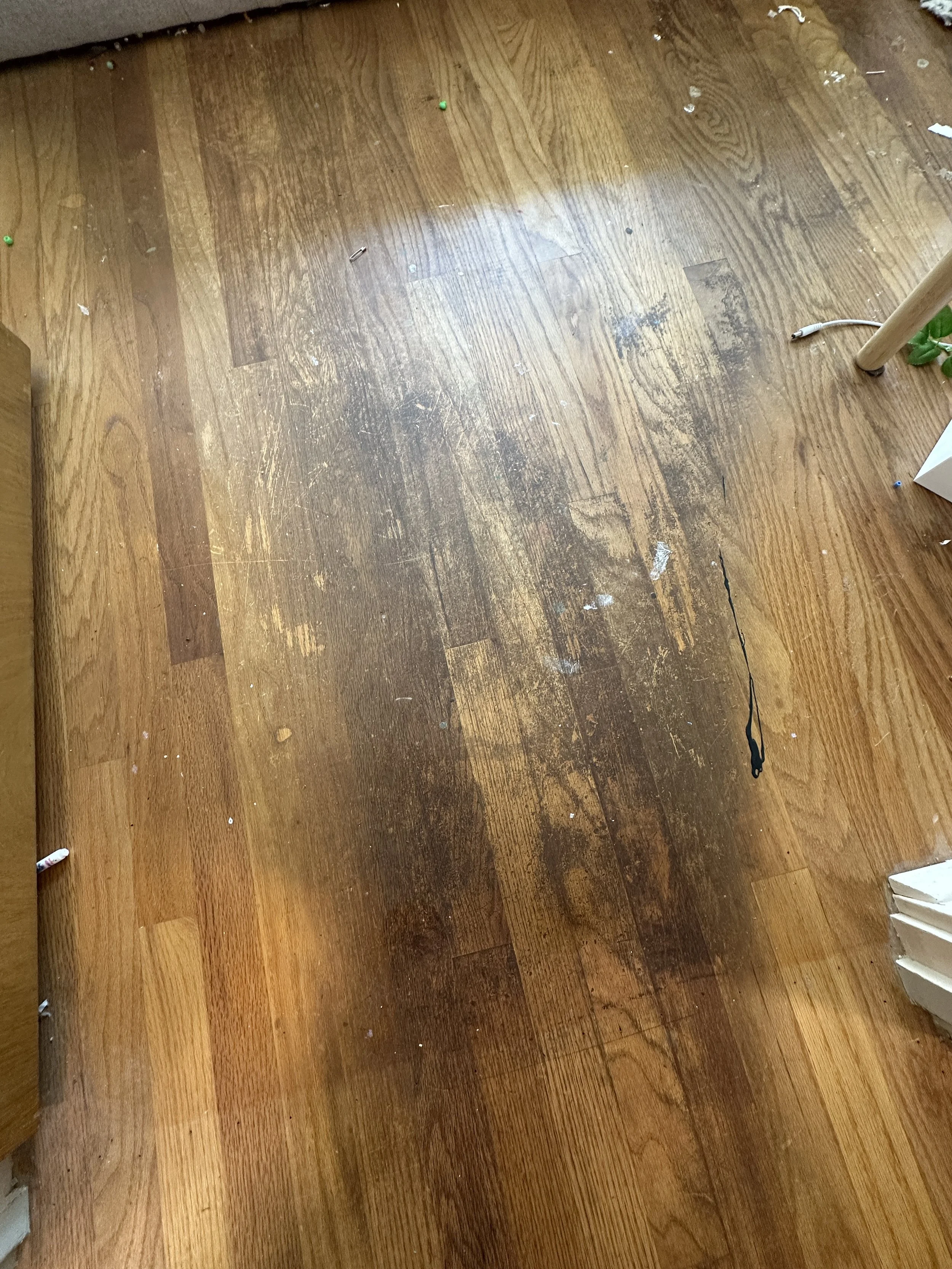 Yellowed old oak hardwood floors in Seattle home before refinishing