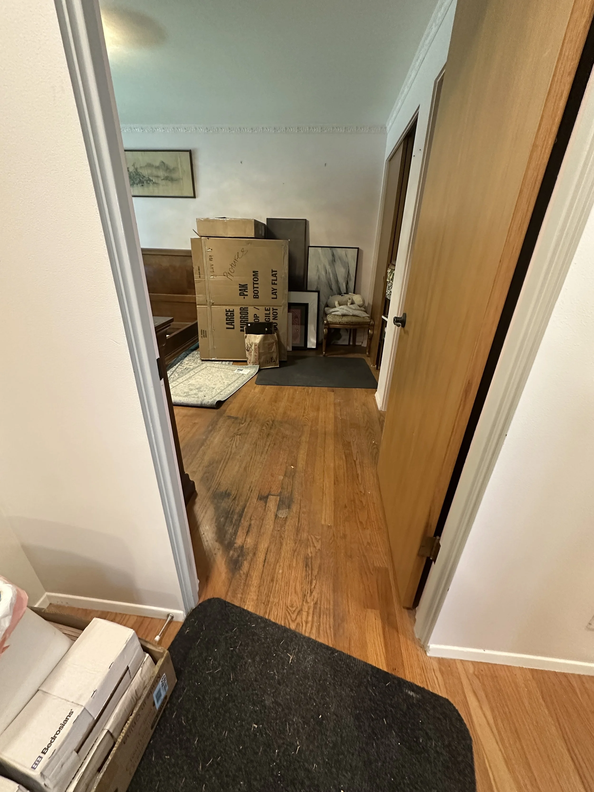 Yellowed old oak hardwood floors in Seattle home before refinishing