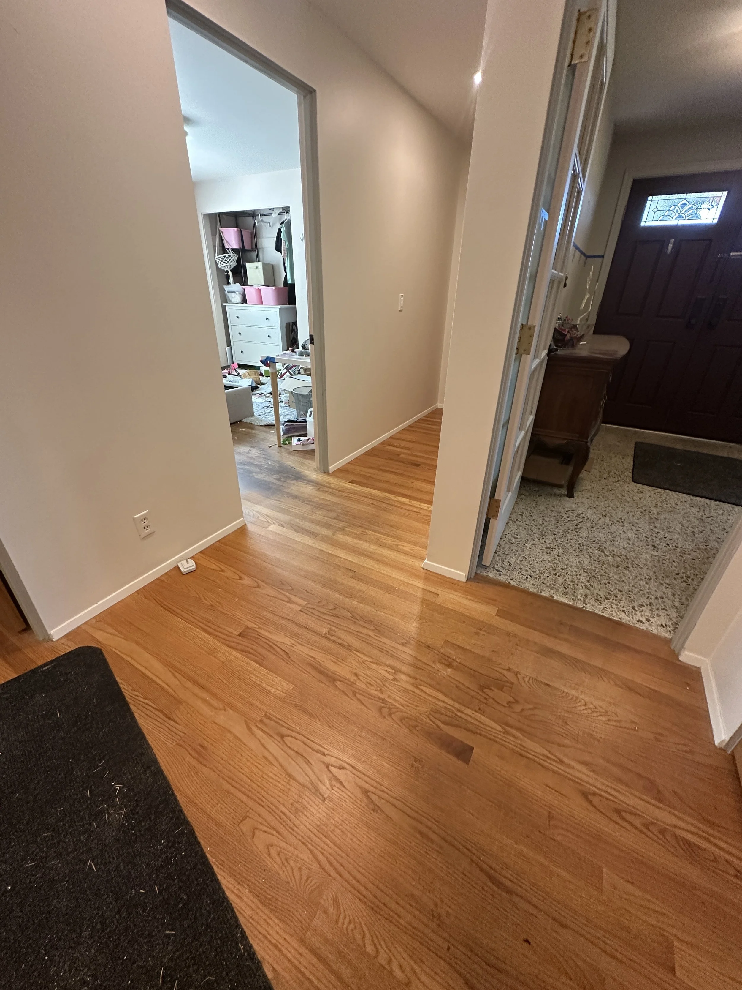 Yellowed old oak hardwood floors in Seattle home before refinishing