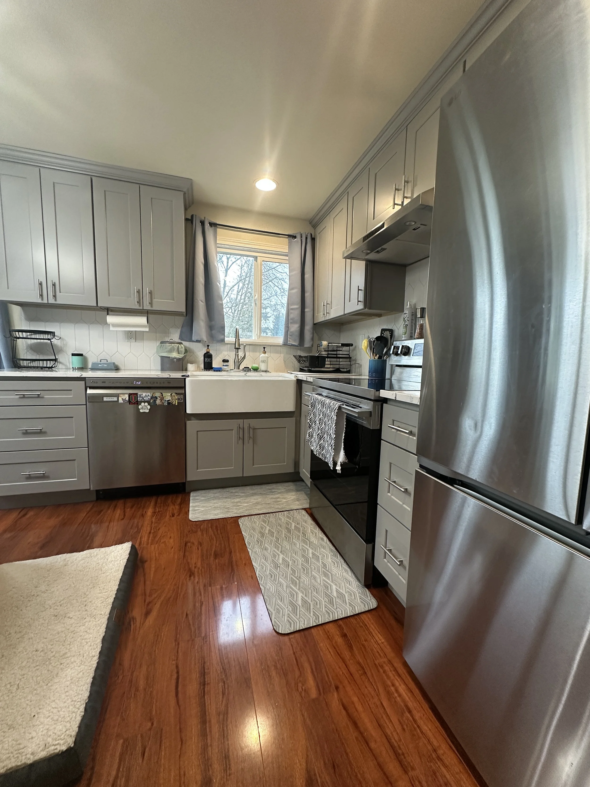 Seattle kitchen remodel after – bright airy kitchen with farmhouse sink in Seattle WA