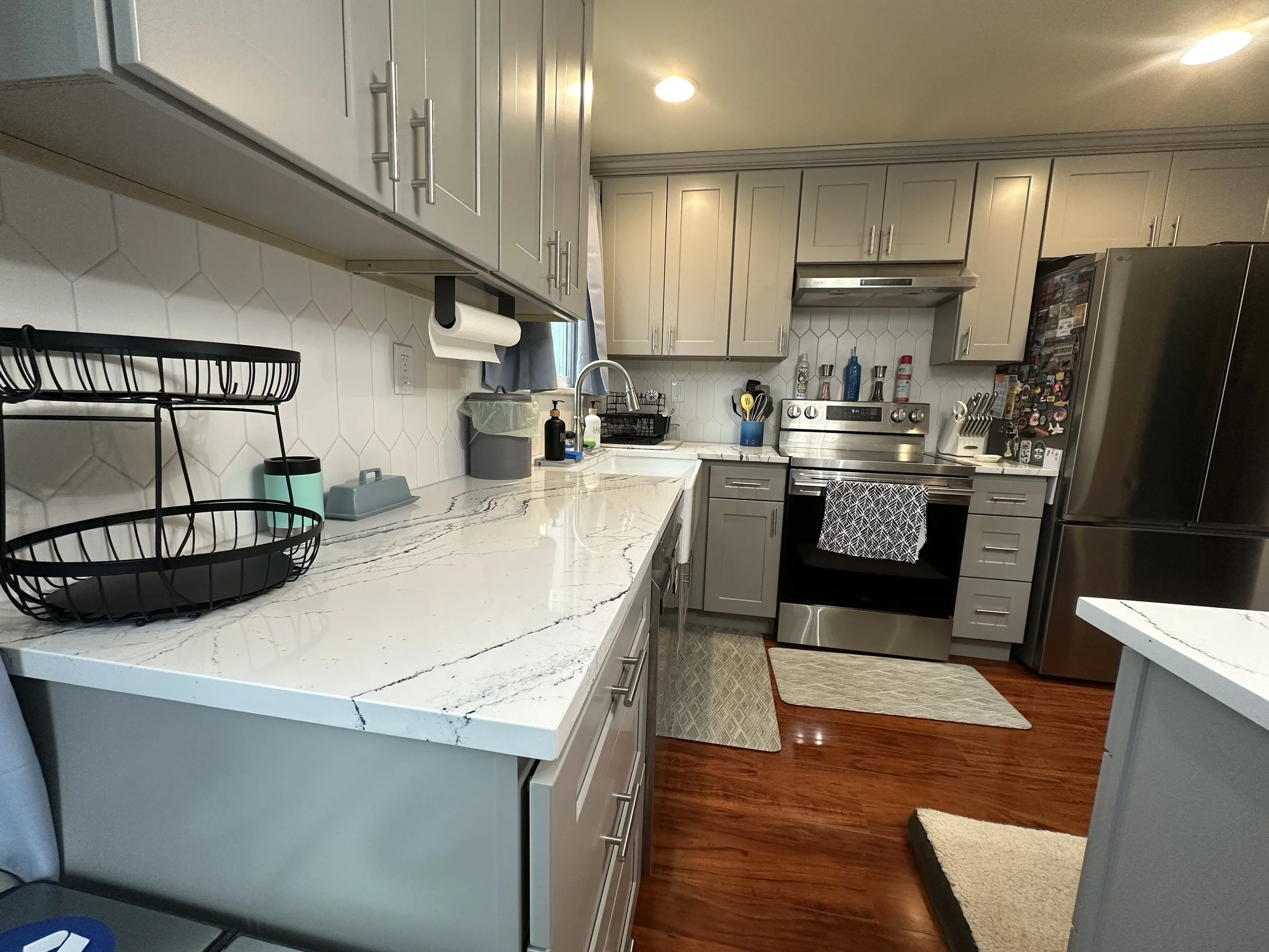 Seattle kitchen remodel after – bright airy kitchen with farmhouse sink in Seattle WA