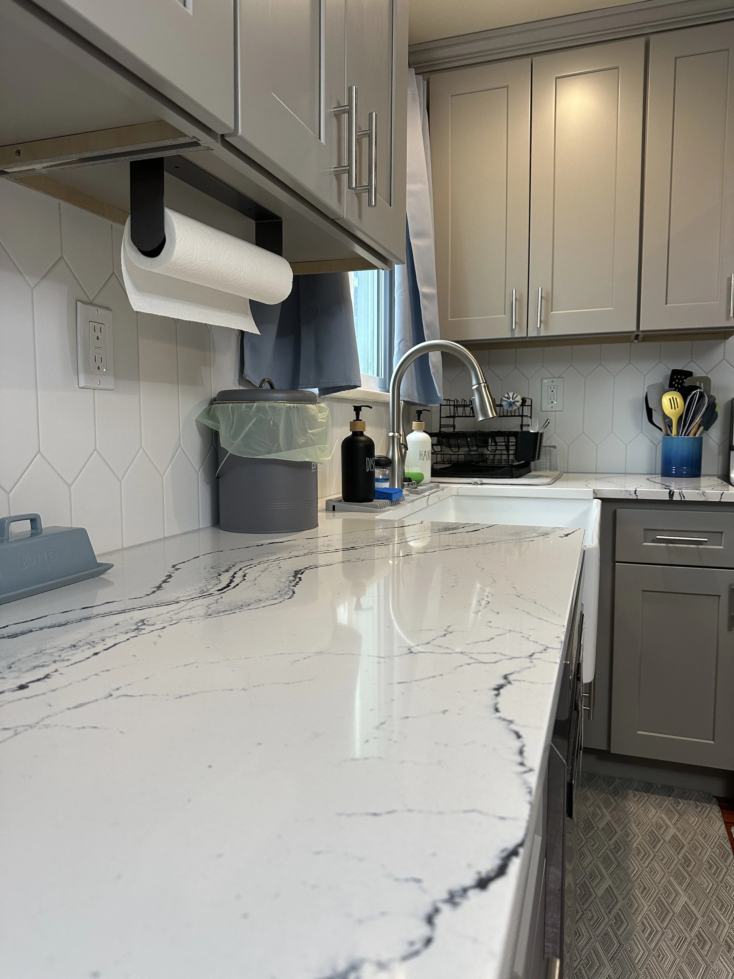 Seattle kitchen remodel after – bright airy kitchen with farmhouse sink in Seattle WA