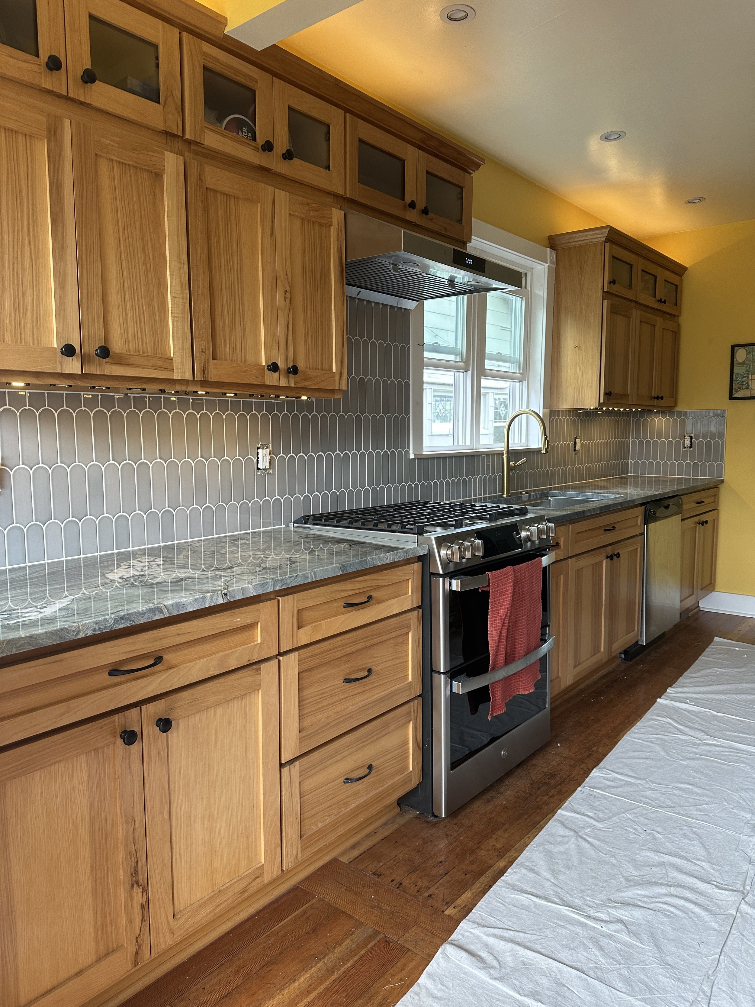 Elegant Gold Faucet and Tile Backsplash - Baklinski Project