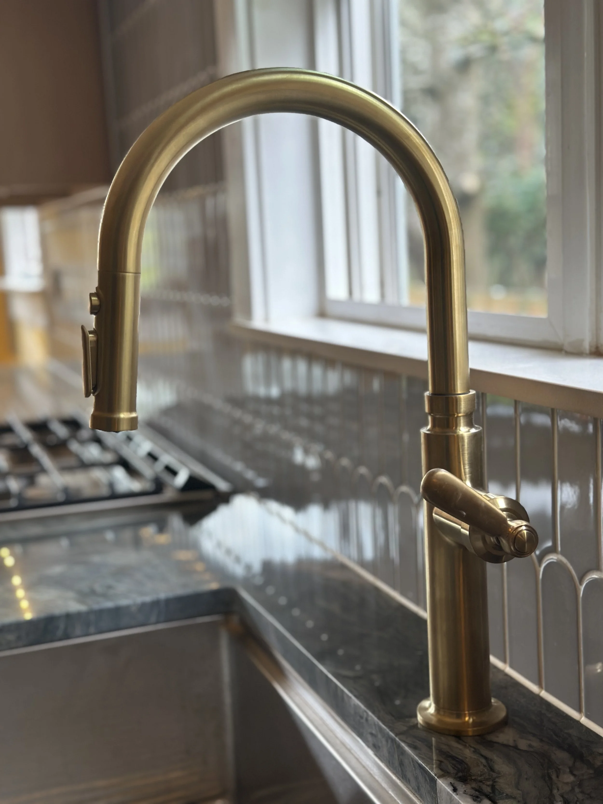 Elegant Gold Faucet and Tile Backsplash - Baklinski Project