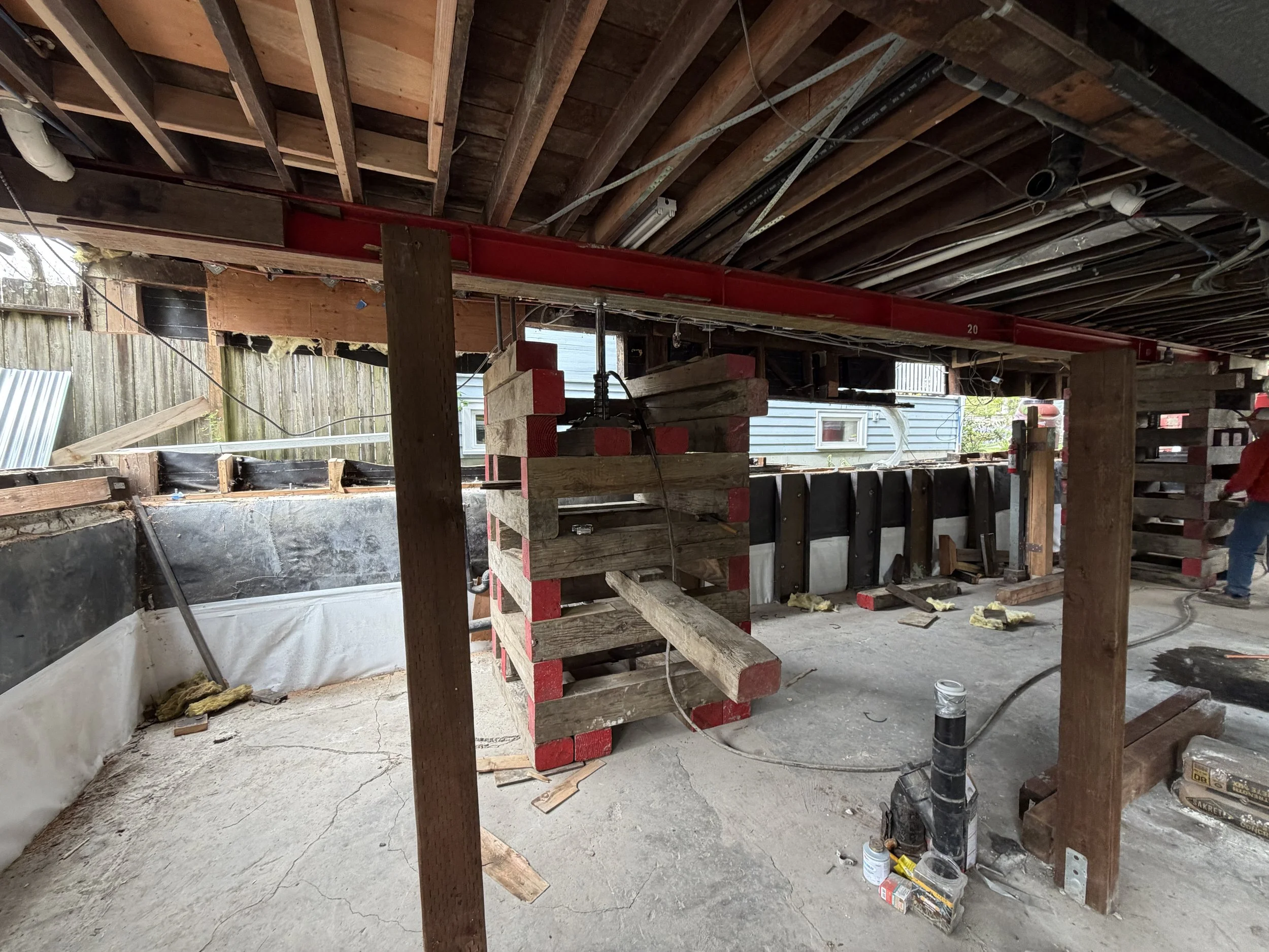 House lifted 2 feet with cribbing and supports