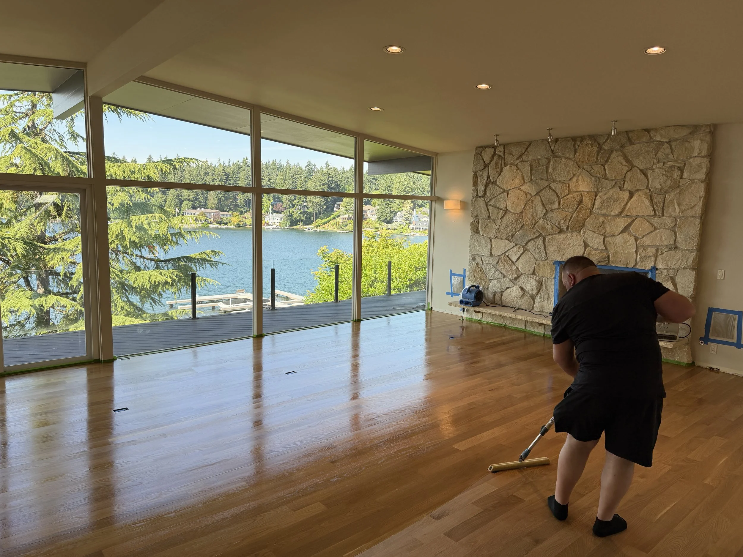 Reviving Tired Floors: How We Brought Old Engineered Wood Floors Back to Life in Seattle (Spoiler: They Look Brand New!)