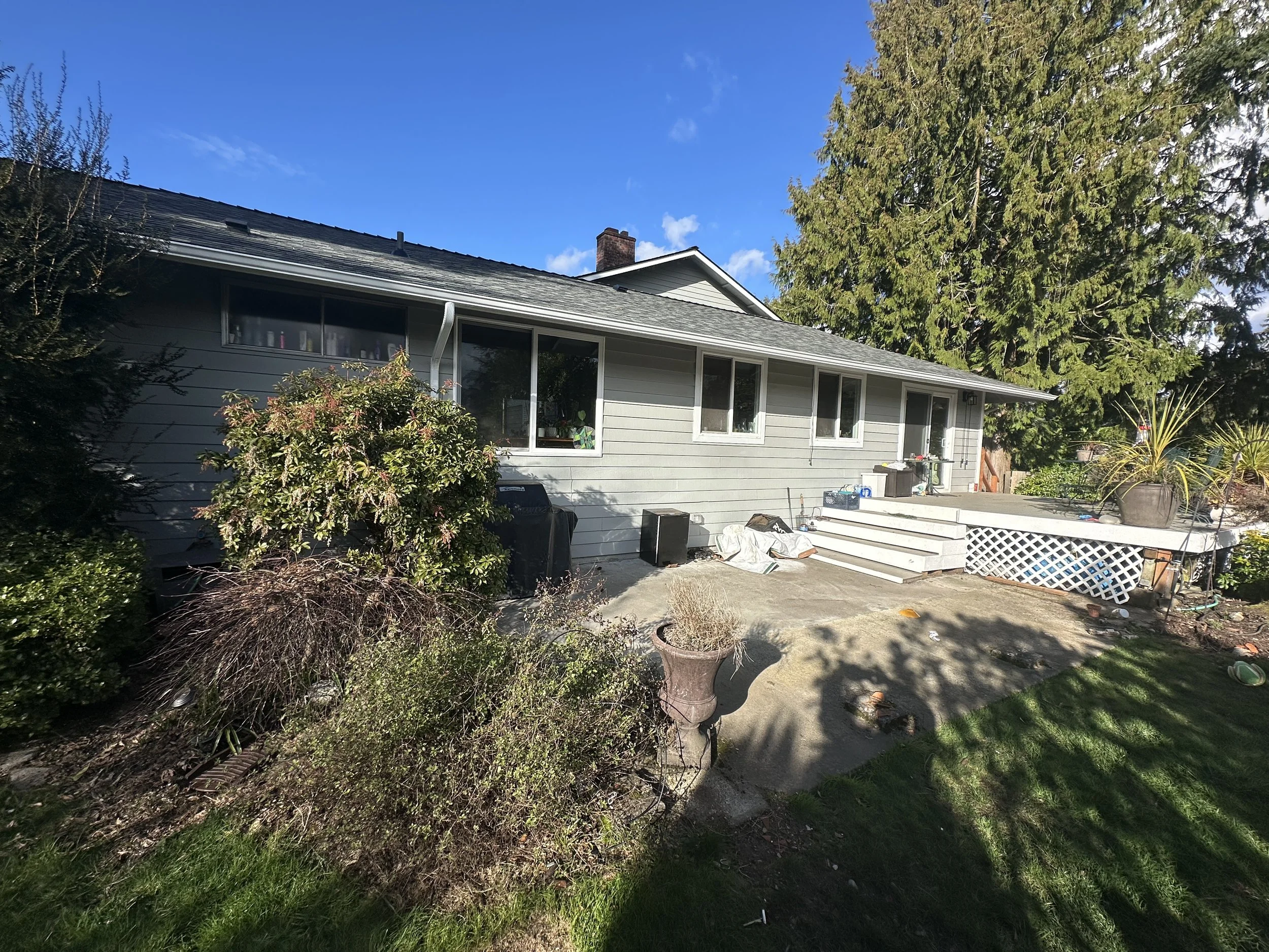Beautiful new custom wood frame awning installed on a Bellevue, WA deck by Baklinski Home Improvement