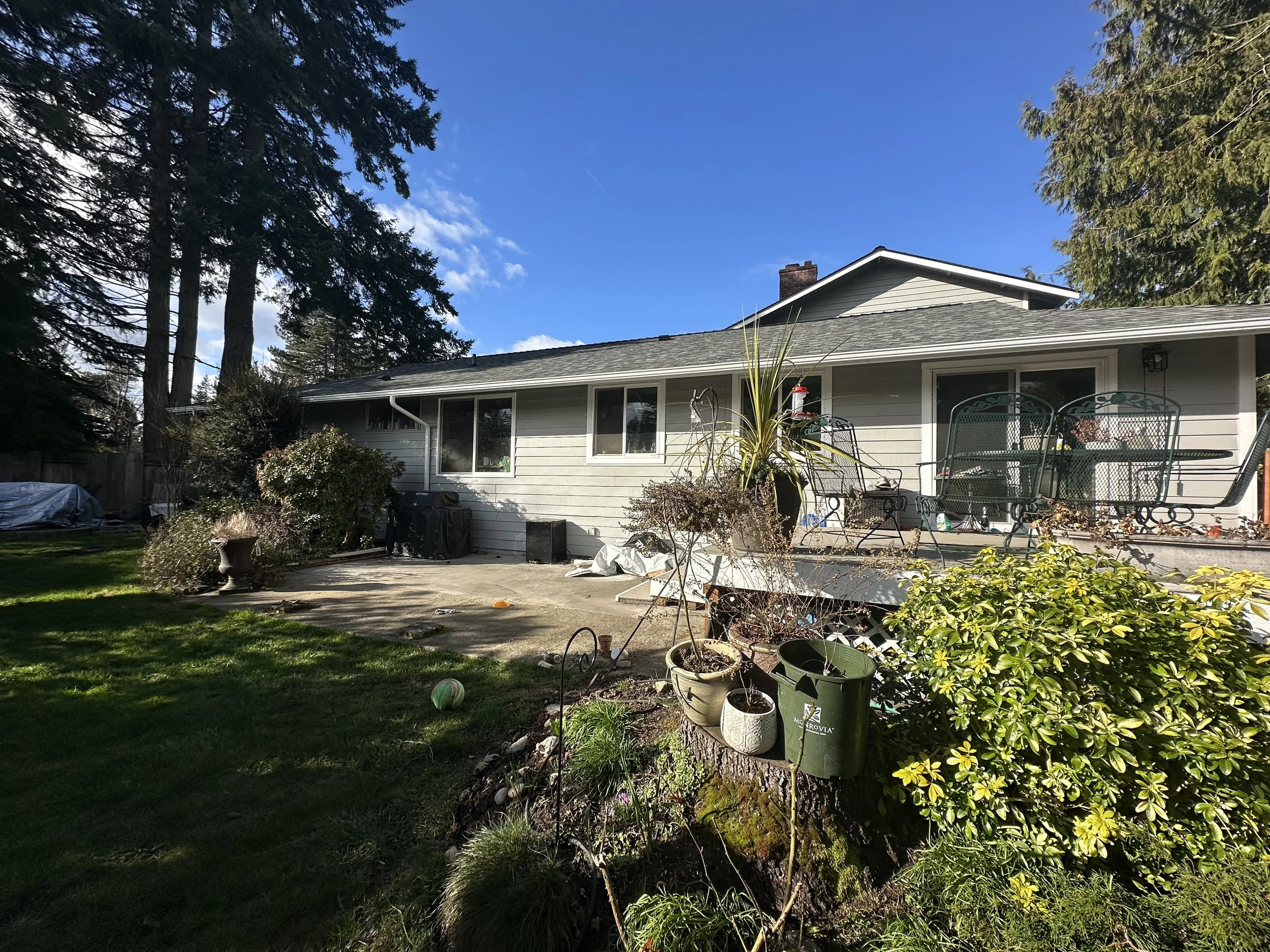 Beautiful new custom wood frame awning installed on a Bellevue, WA deck by Baklinski Home Improvement