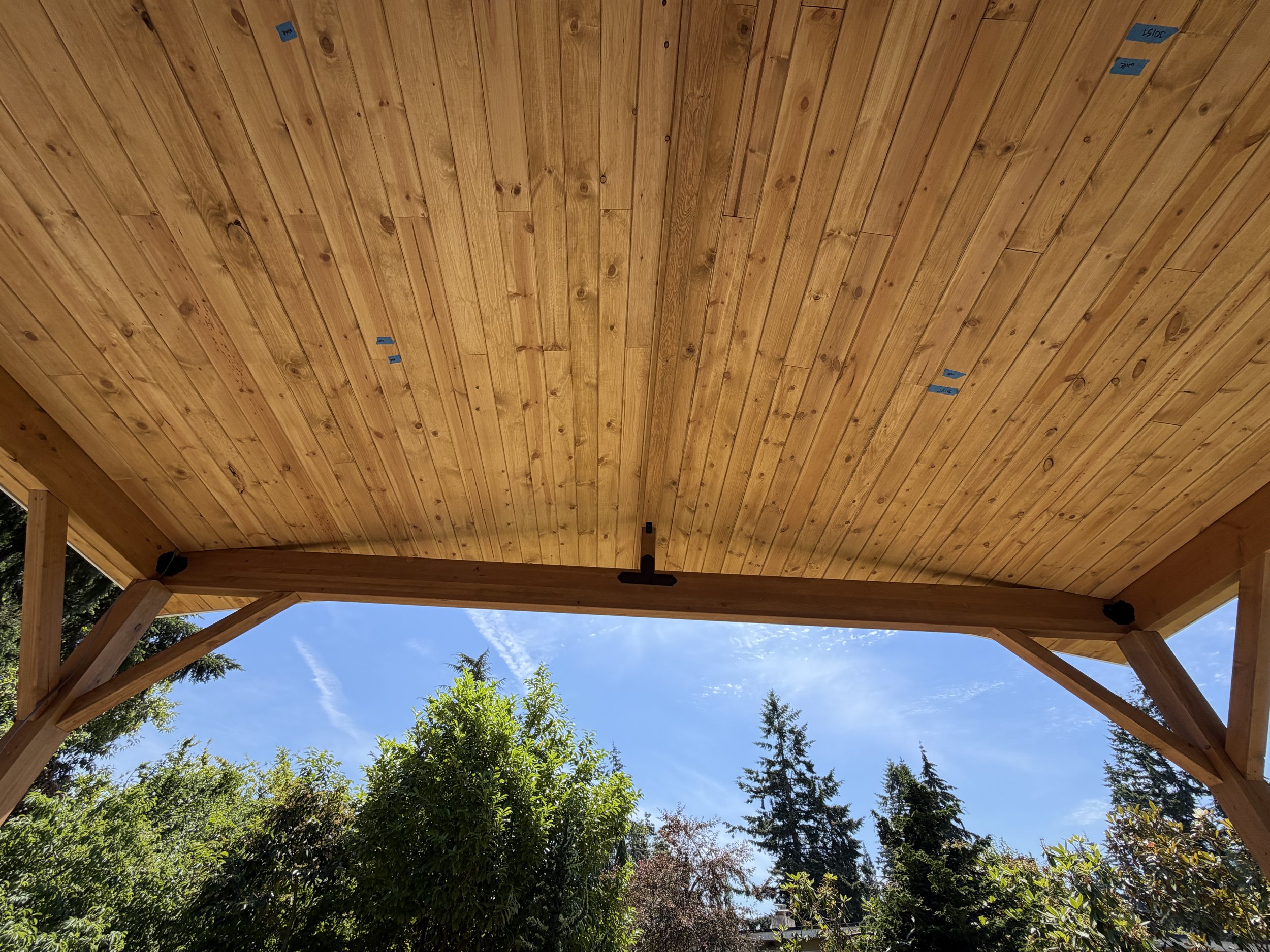 Beautiful new custom wood frame awning installed on a Bellevue, WA deck by Baklinski Home Improvement