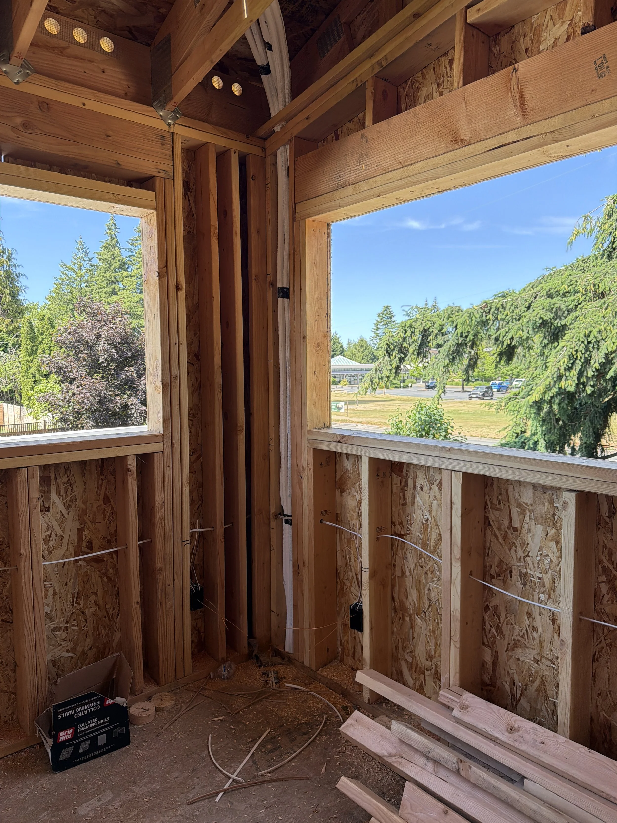 Window header with king stud and jack stud spanning opening for load bearing wall Seattle