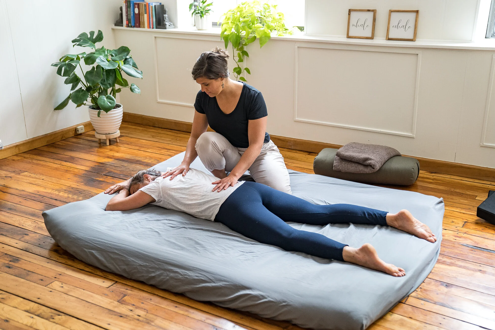 Phoenix Rising Yoga Therapy prone position hands to back of heart Sarah Quinttus Yoga Therapy Vermont