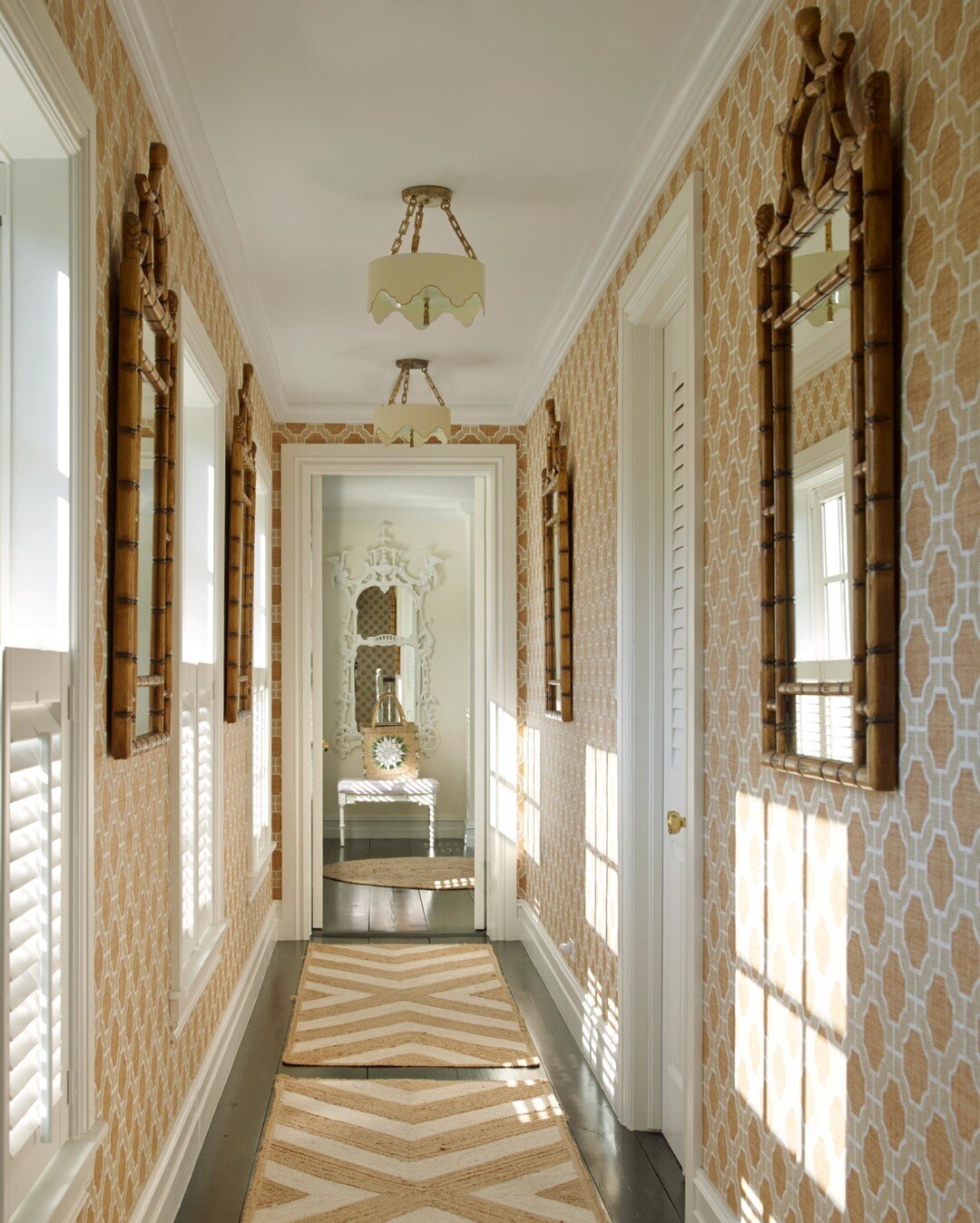 &quot;A grasscloth printed with a geometric pattern plays off the geometrically patterned straw runners.  A whimsical tall and thin Chippendale-style mirror punctuates the end of the hallway.&quot; - Amanda quoted from her book, Island Hopping 📔✨🌴⠀