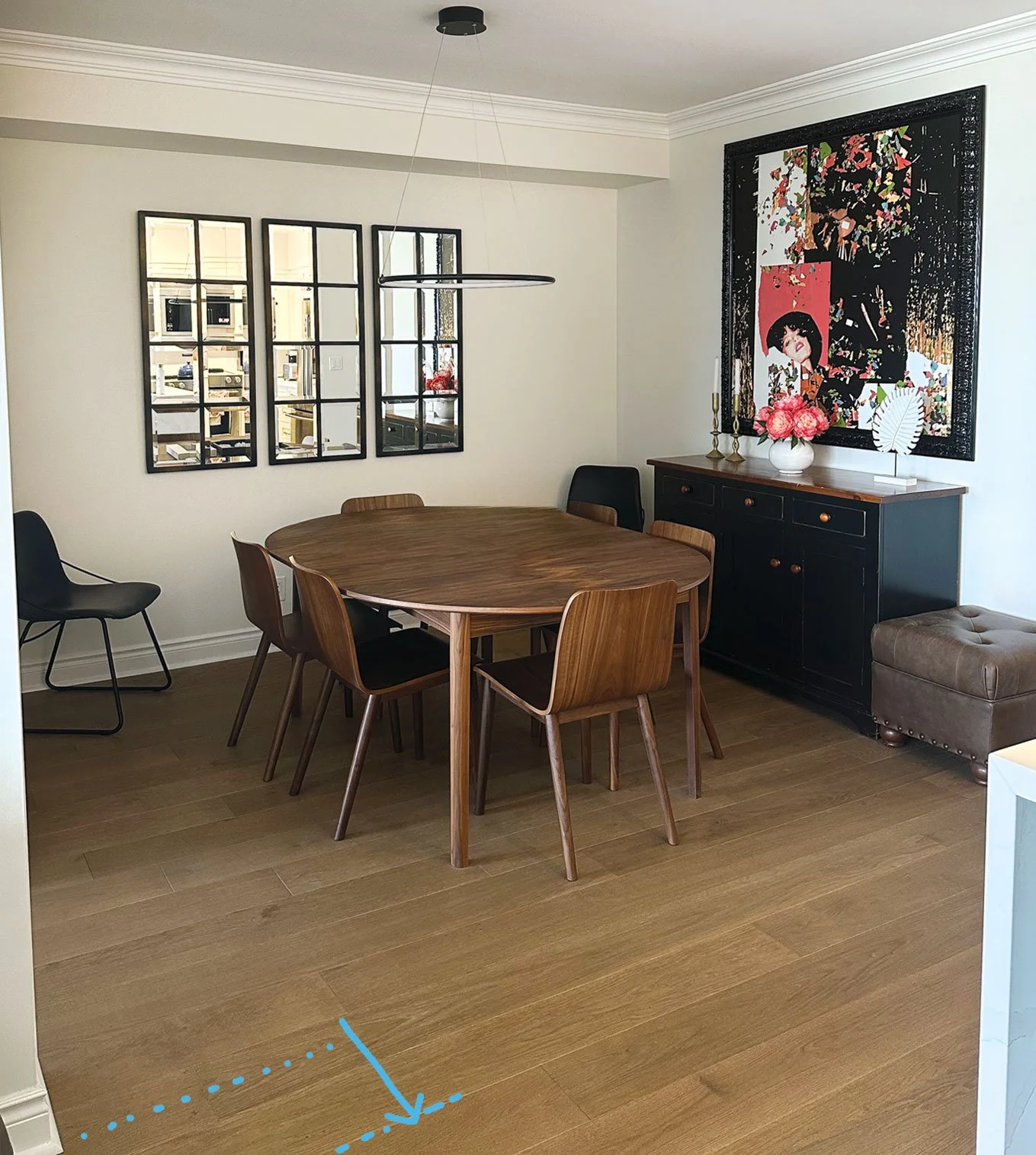• Chandelier was already installed. Dining room table is in best placement. Wasn't enough room on back wall to place dining hutch for table to be horizontal • Rug used to be here, didn’t fit space properly as it came out further past walls into hallw
