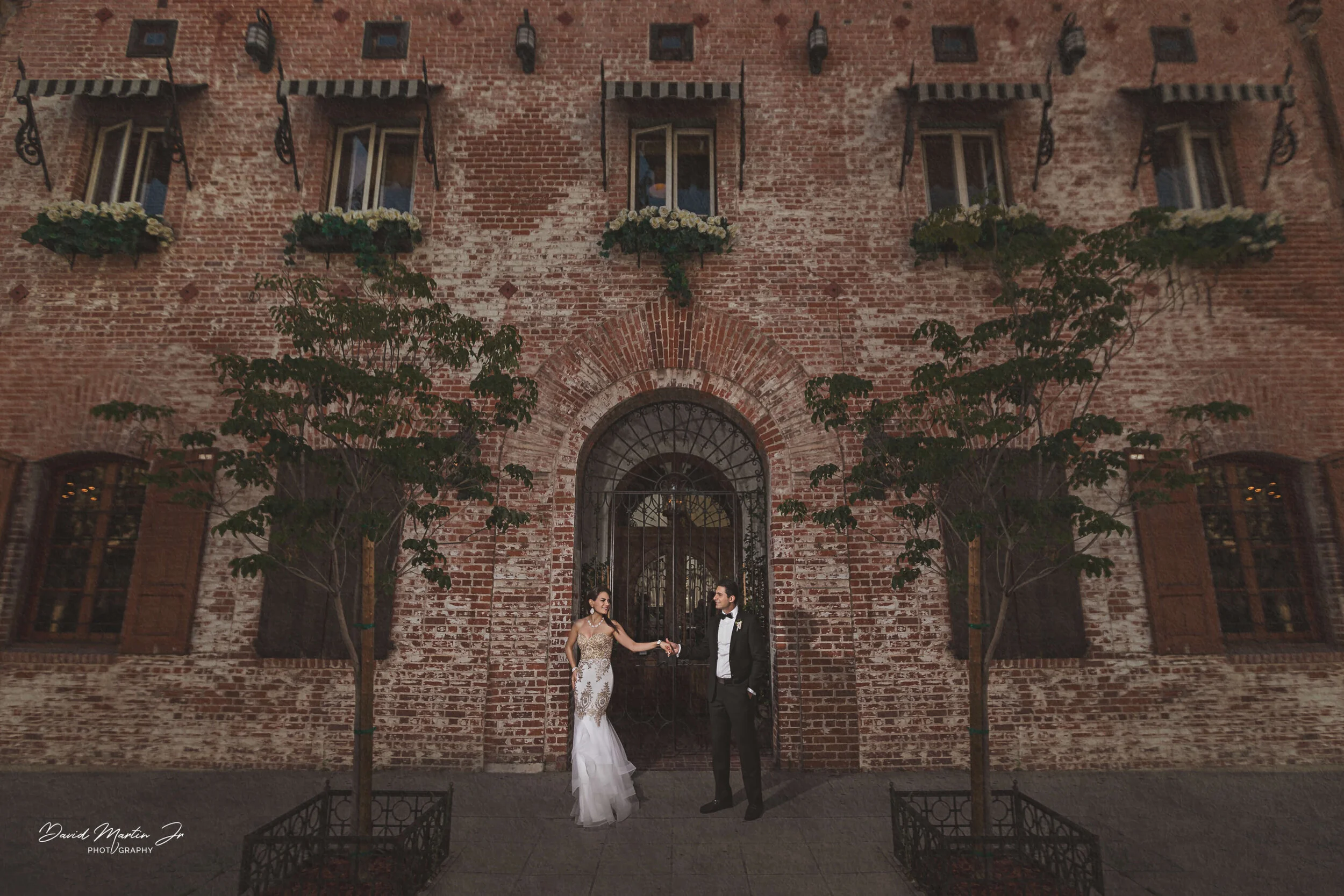 The bride giving her hand to the groom at The Carondelet House in Los Angeles, CA
