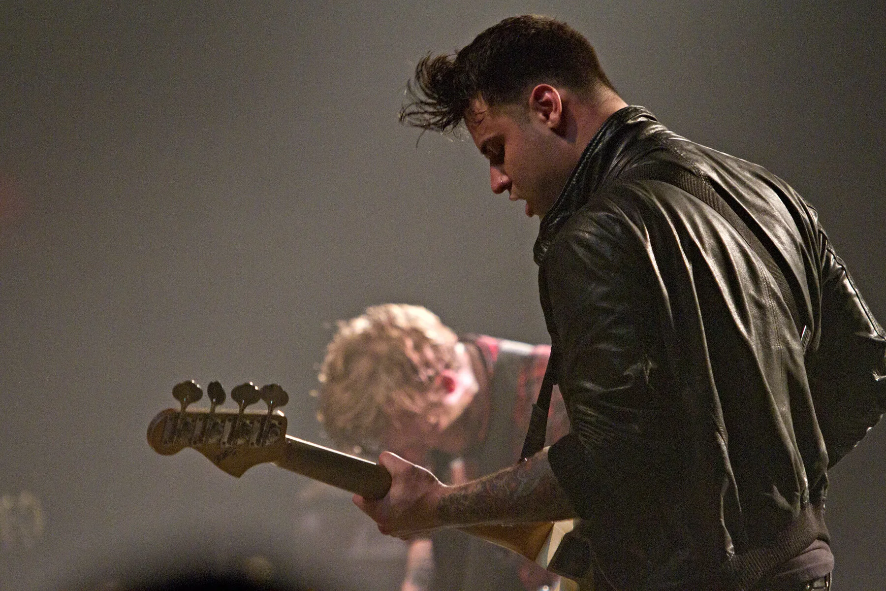 Still Photography  Live performance photography documenting New Jersey punk band The Gaslight Anthem's holiday performance at Asbury Park's Convention Hall with a surprise appearance by Bruce Springsteen. Select images published January 2012 print ed