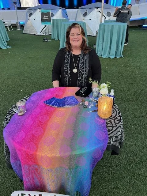 Melinda Pajak giving Tarot Card Readings at a corporate event at Rady Shell