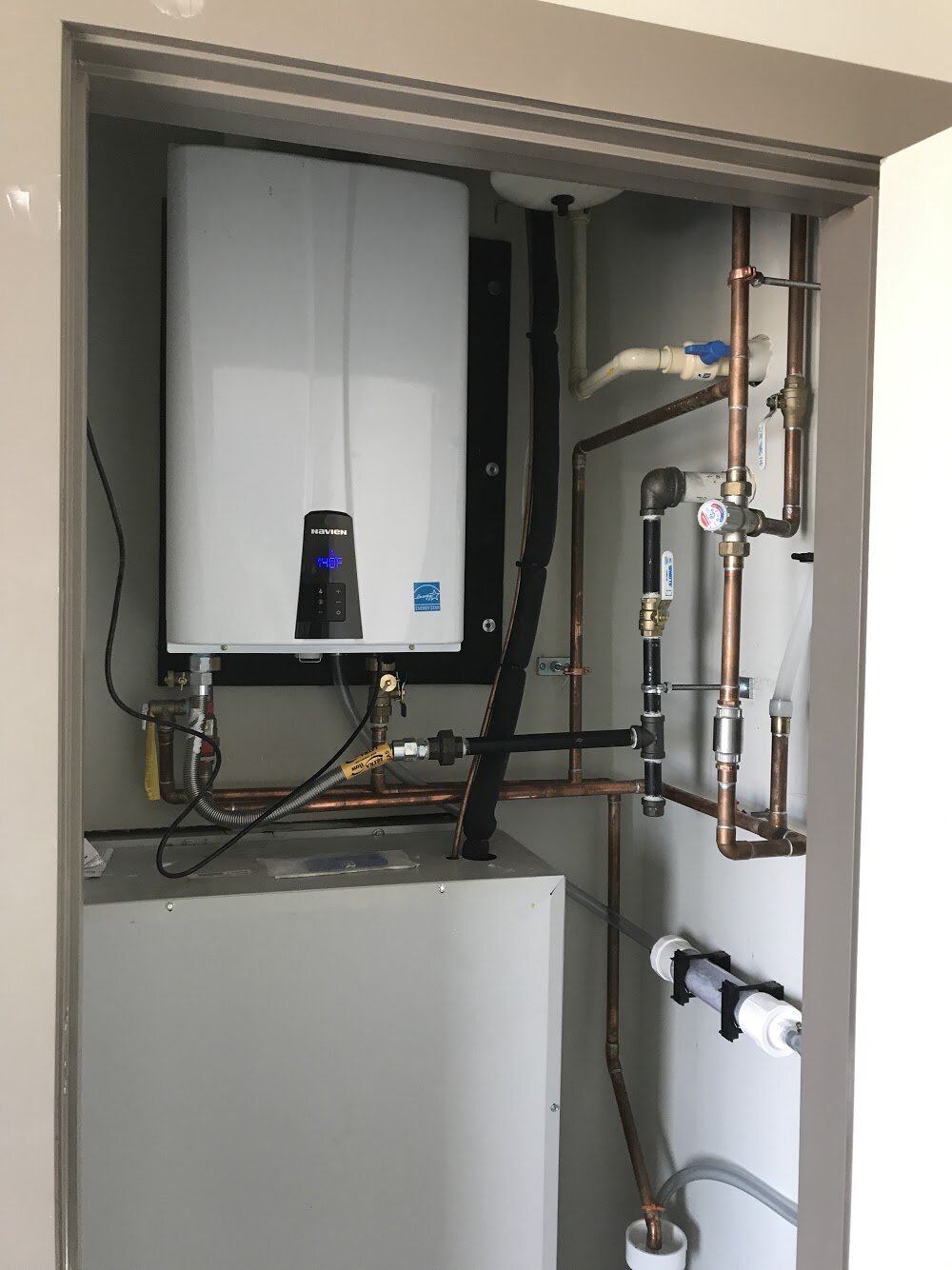 Navien water heater quality installation Concord NH residential tankless wall-hung hot water