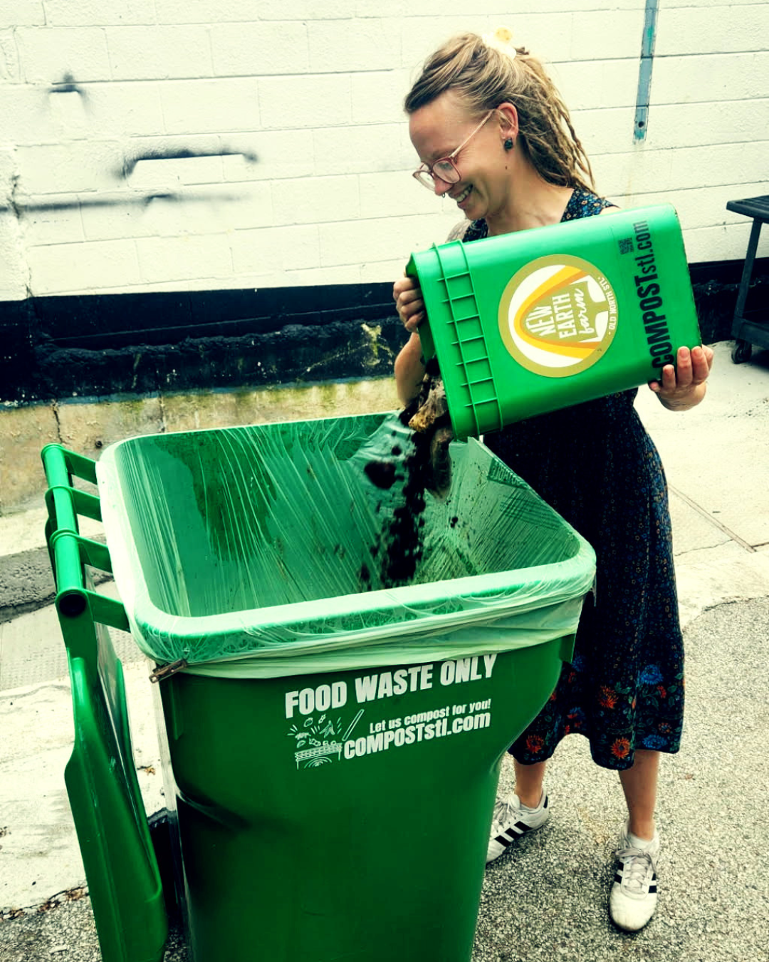 compoststl.com food waste bin being used