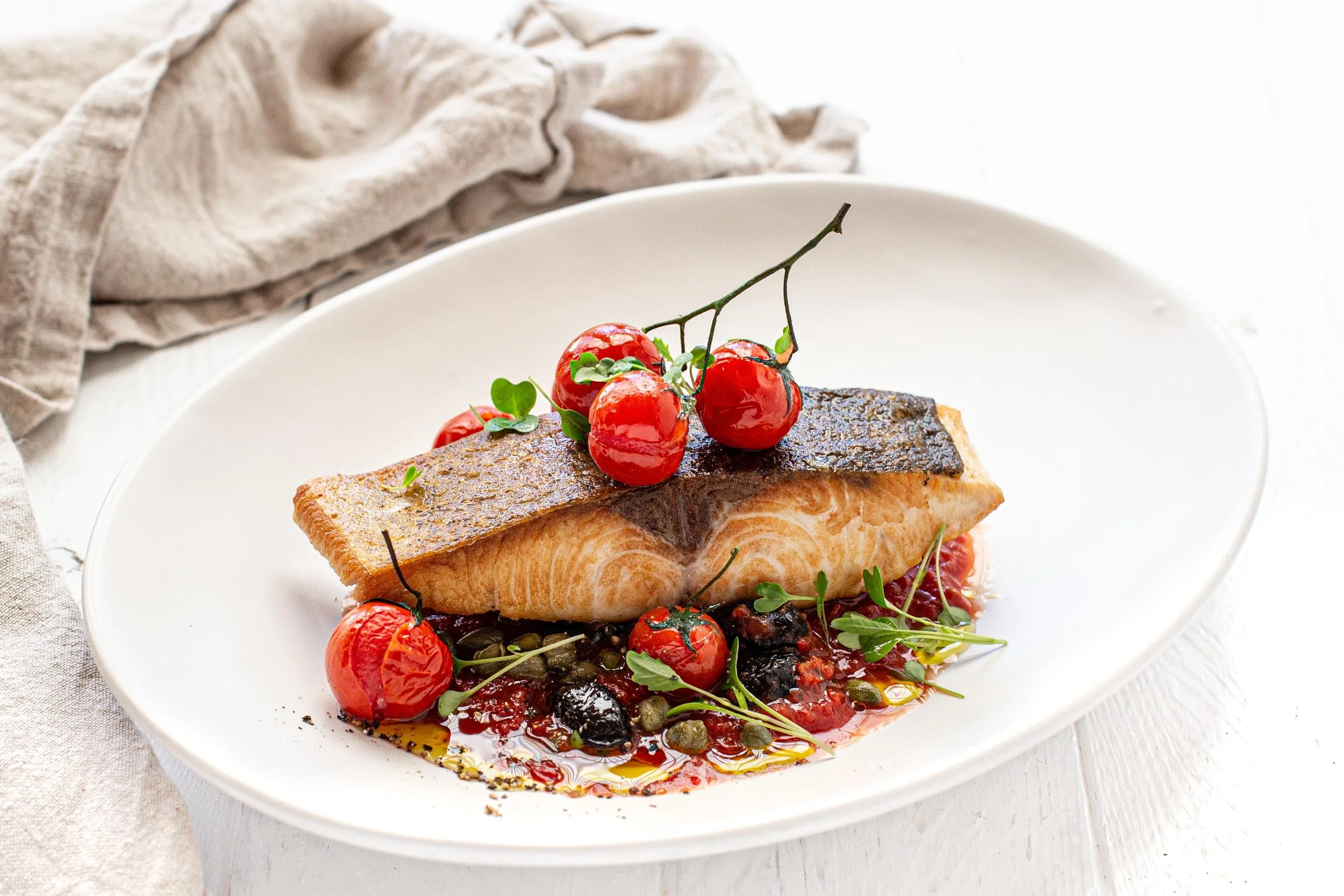 Grilled King Fish Fillets with Puttanesca Sauce — Angelakis Bros