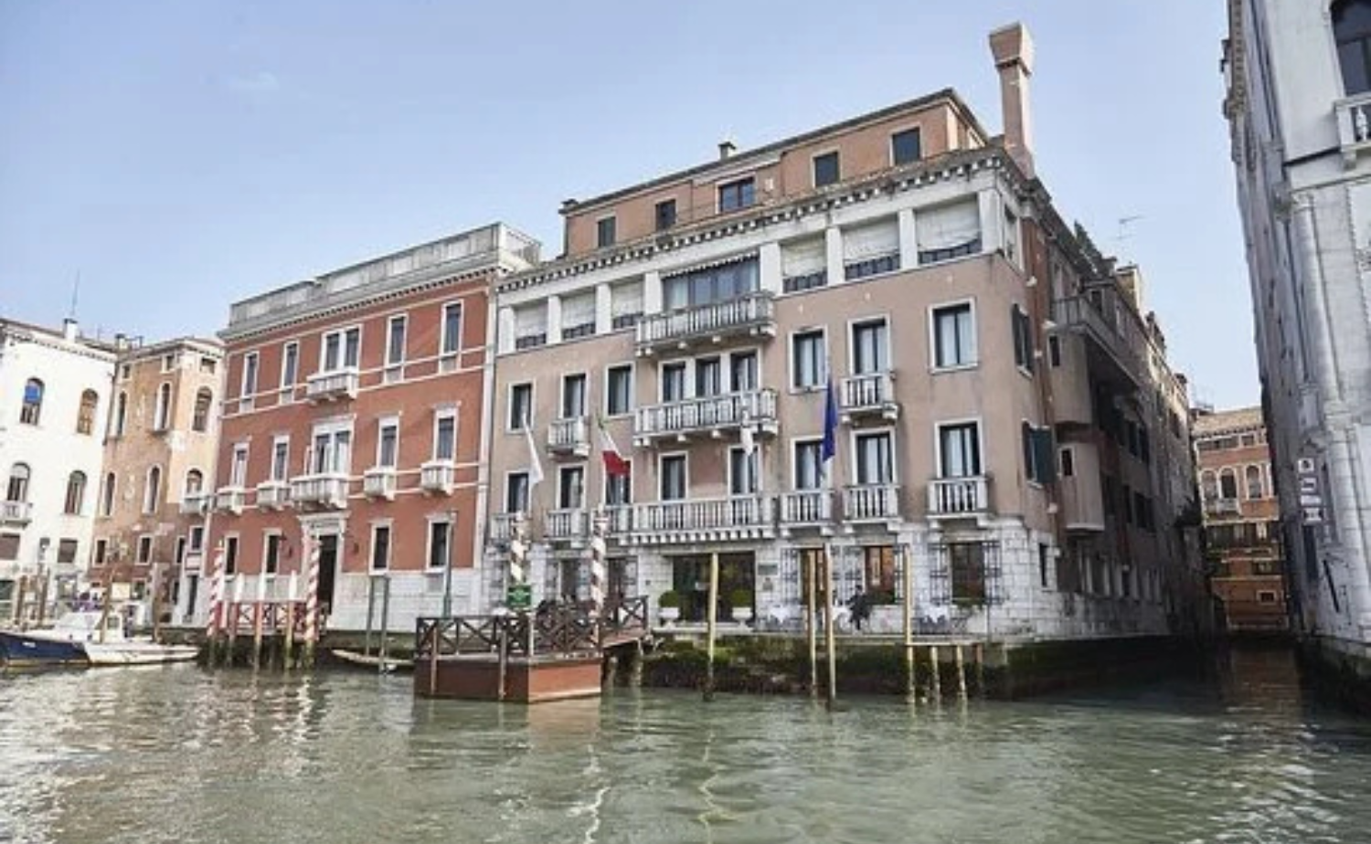 Exterior view of Sina Palazzo Sant’Angelo hotel along the Grand Canal in Venice, Italy