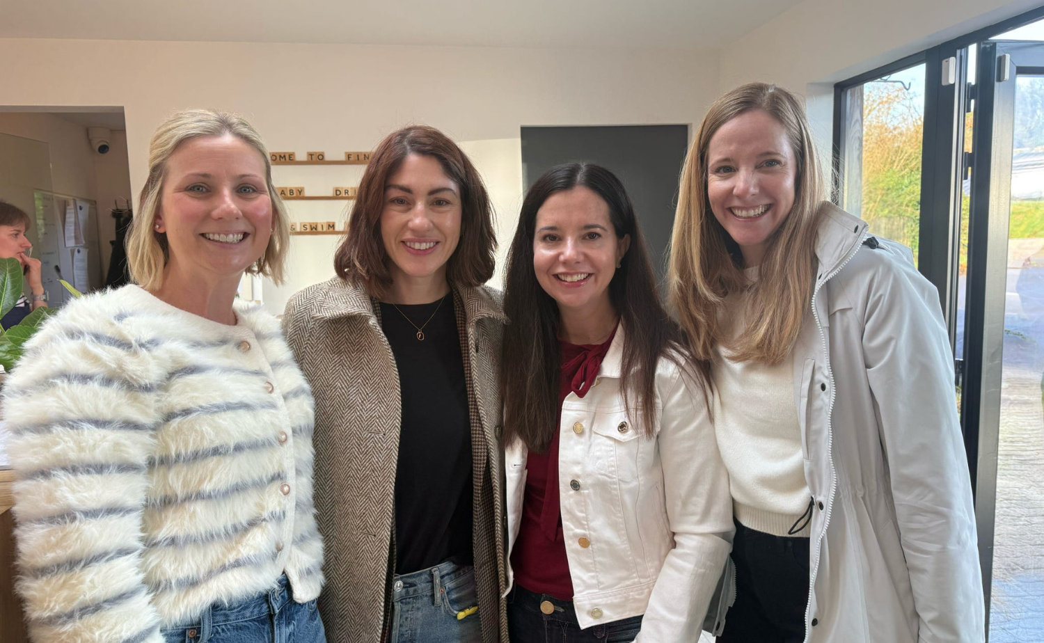 Gillian, the owner of Finn Lough, posing with Laura, her sister, and a travel agent friend inside the property in Northern Ireland.