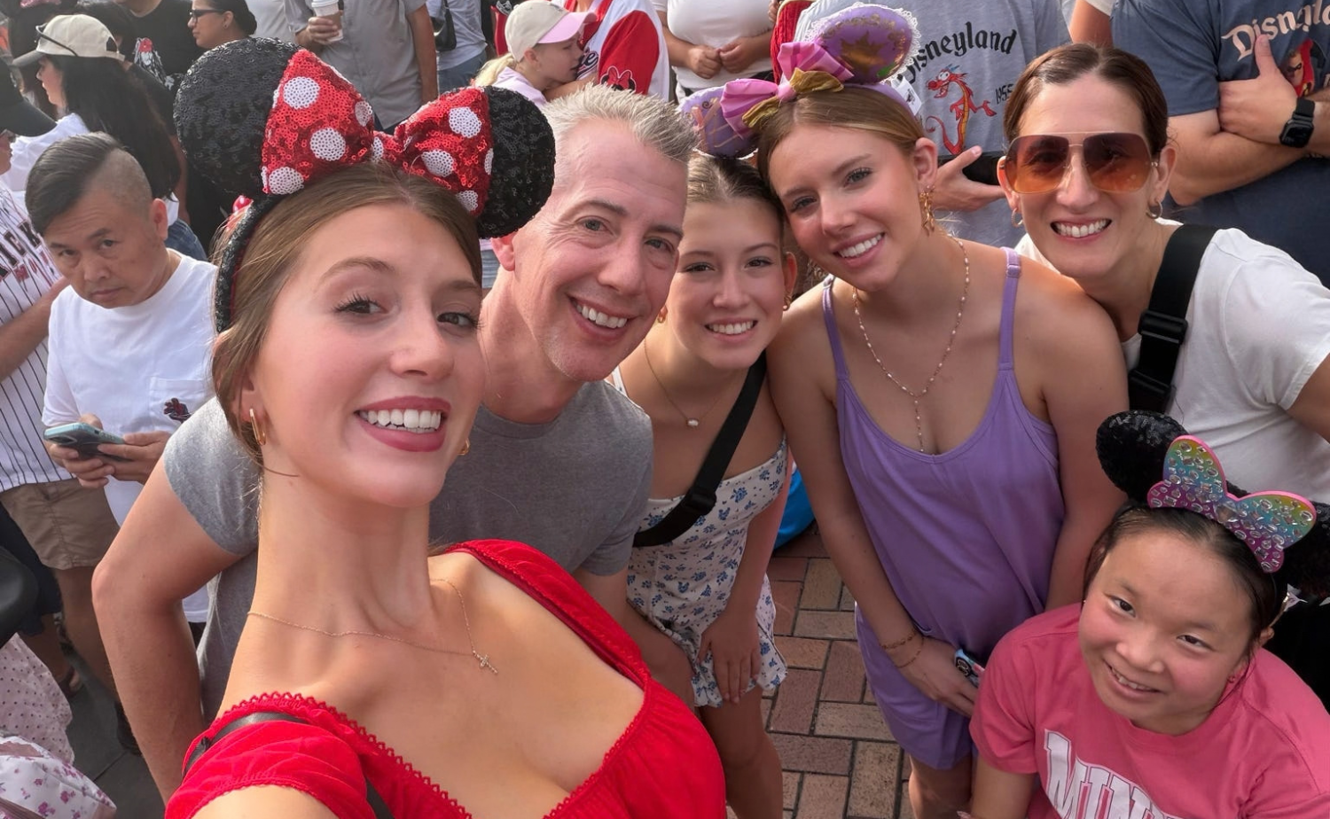 Katie, Hannah and their family together during their Disneyland vacation.