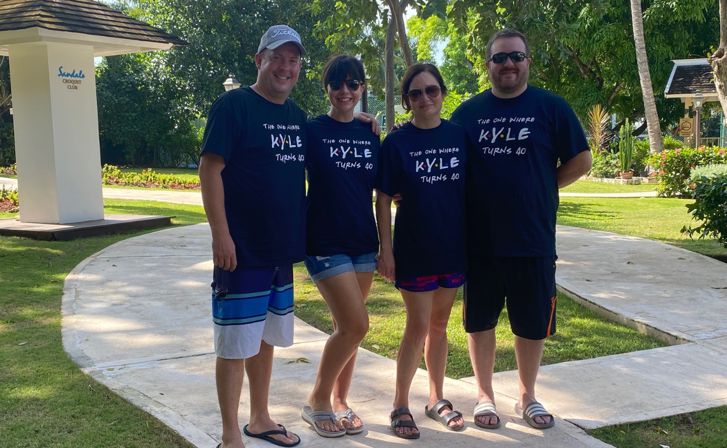 Four friends celebrating Kyle’s 40th birthday at a tropical resort in Jamaica.