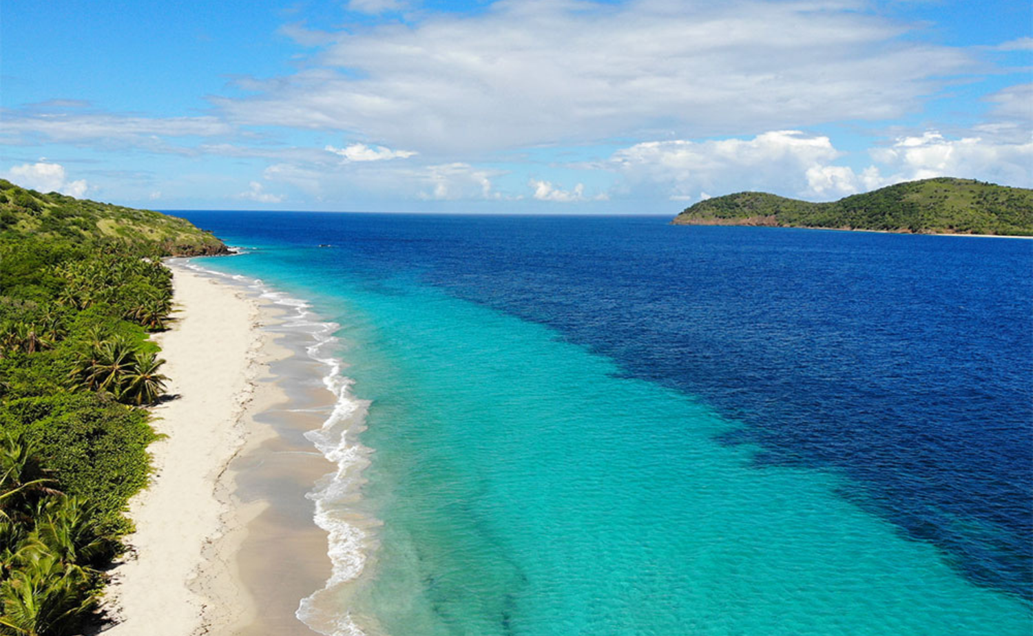 Quiet white sand beach and turquoise Caribbean water on Culebra, Puerto Rico.