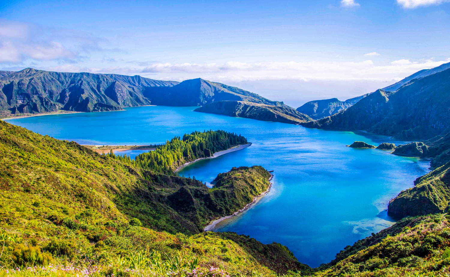 Panoramic view of the Sete Cidades crater lakes on São Miguel Island in the Azores, showcasing one of Portugal's most breathtaking hidden gems beyond Lisbon and Porto.