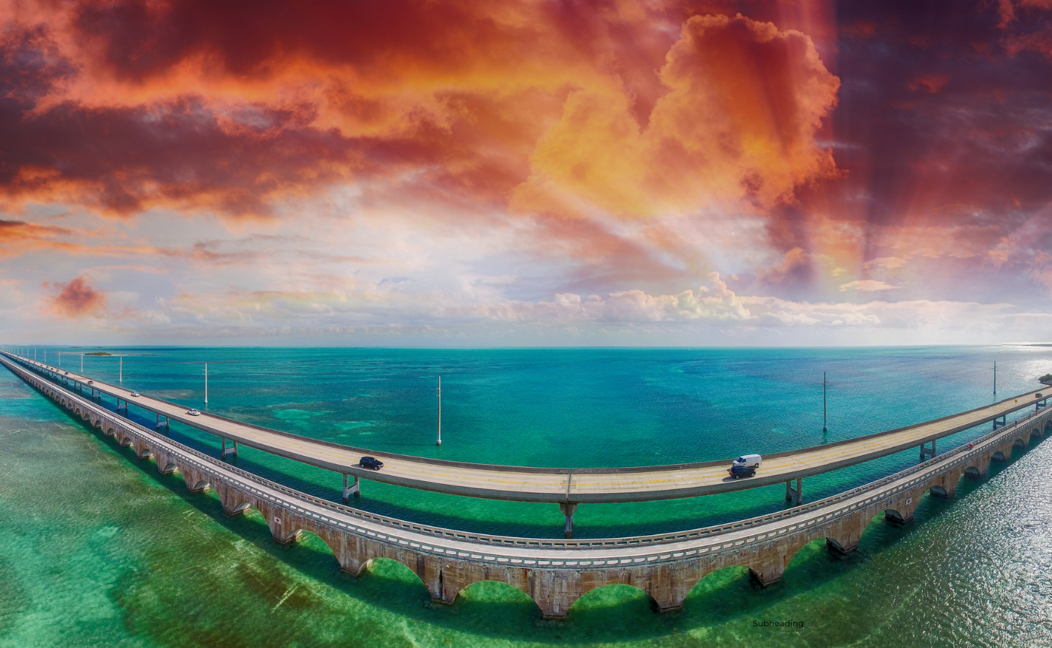 The Overseas Highway spans the turquoise waters of the Florida Keys under a vibrant sky.