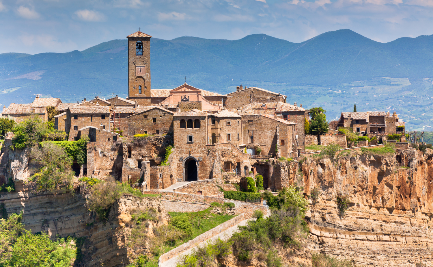 The ancient hilltop village of Civita di Bagnoregio perched dramatically above the surrounding valley in Lazio, Italy.