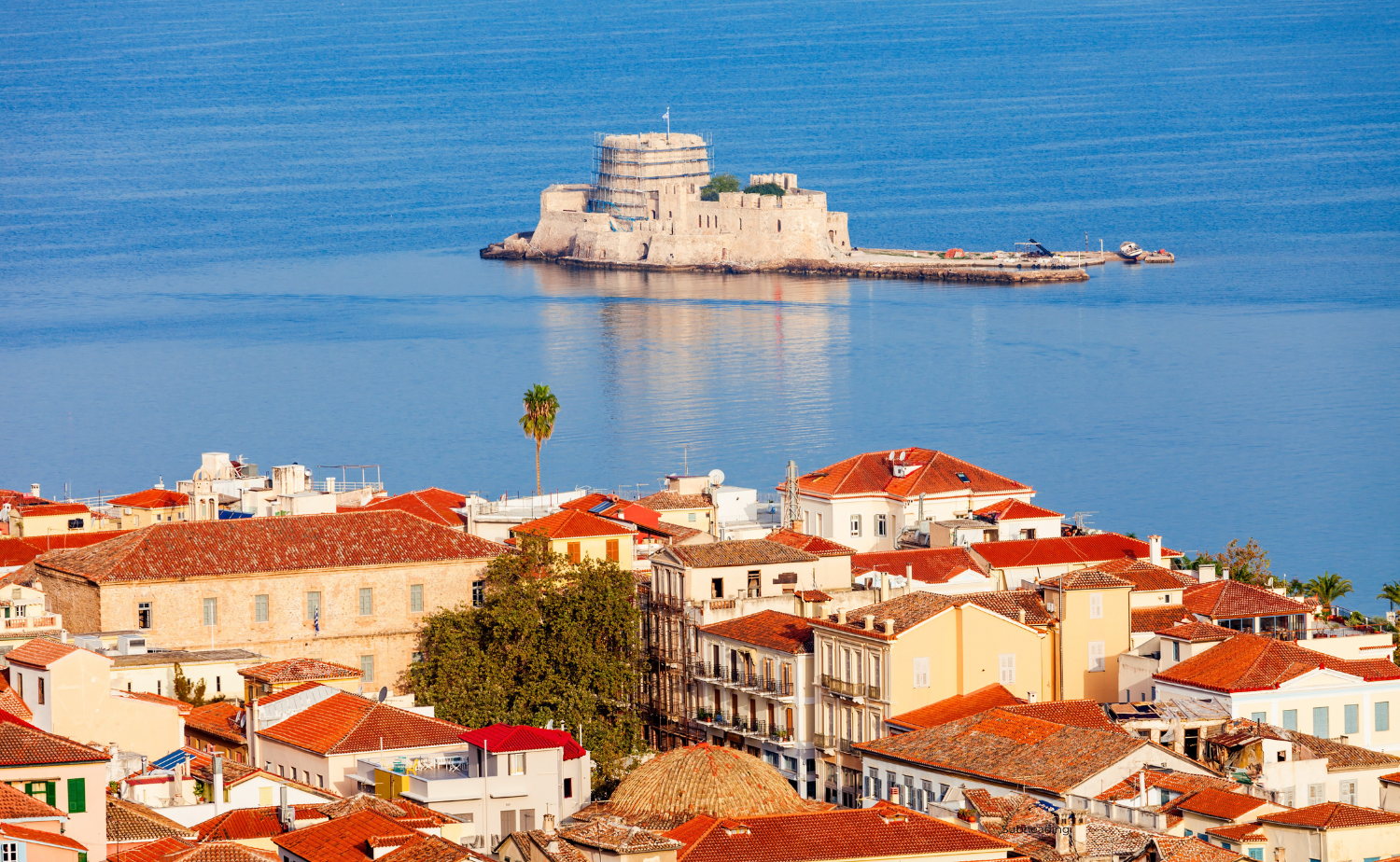 Bourtzi Castle on a small islet off the coast of Nafplio, surrounded by calm blue water