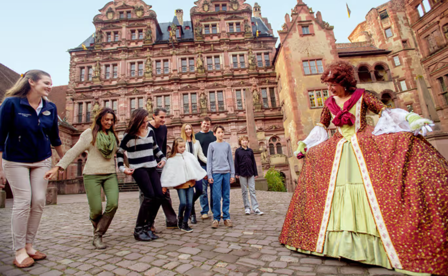 Multigenerational family participating in a guided cultural experience during a European river cruise excursion