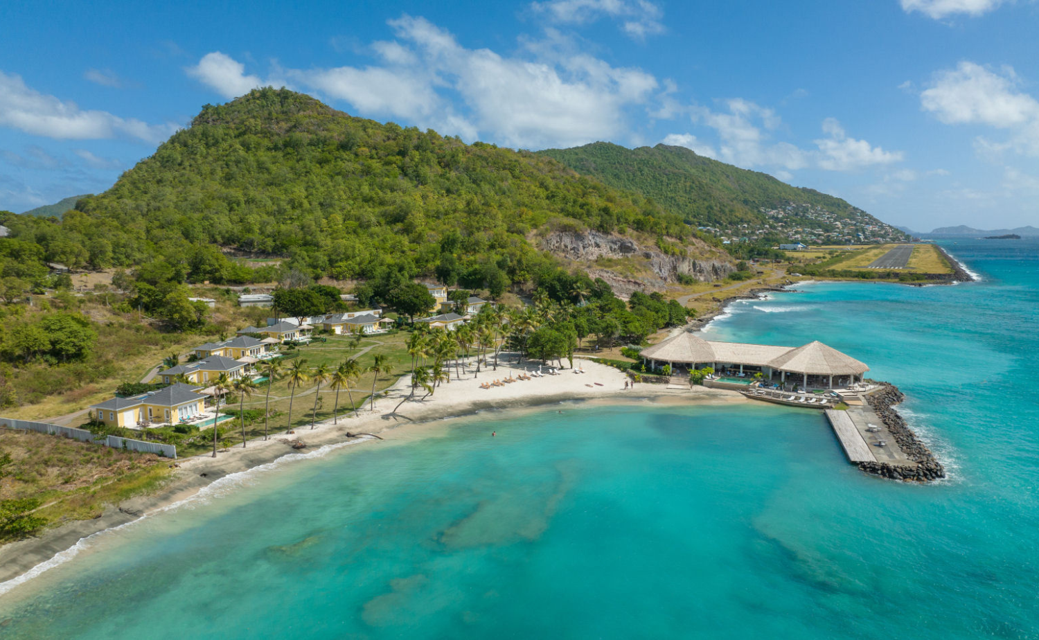 Aerial view of The Liming resort and turquoise Caribbean water on Bequia in St. Vincent and the Grenadines.