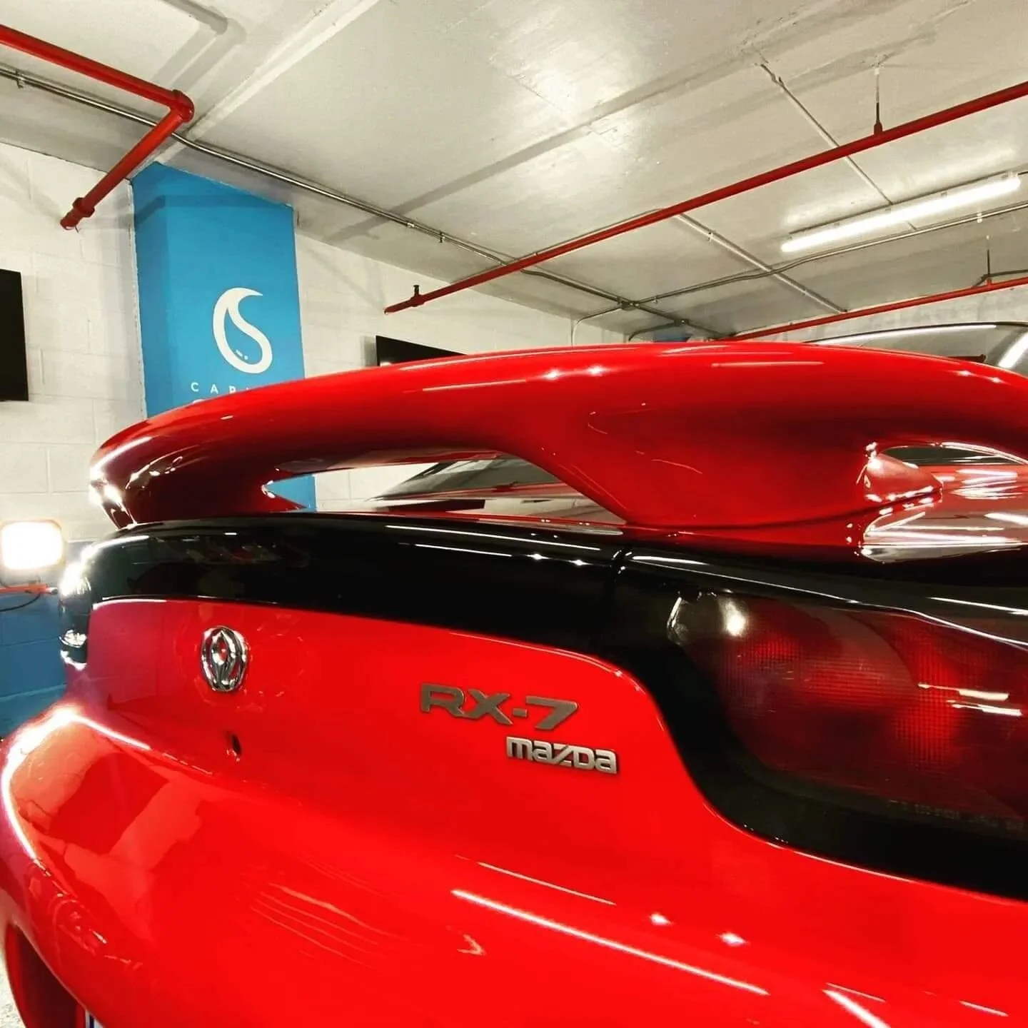 😎 Look at that gloss! This 1994 Mazda RX-7 received some paint correction and Ceramic Pro Gold to bring out it's true potential #ceramicpro #ceramiccoating