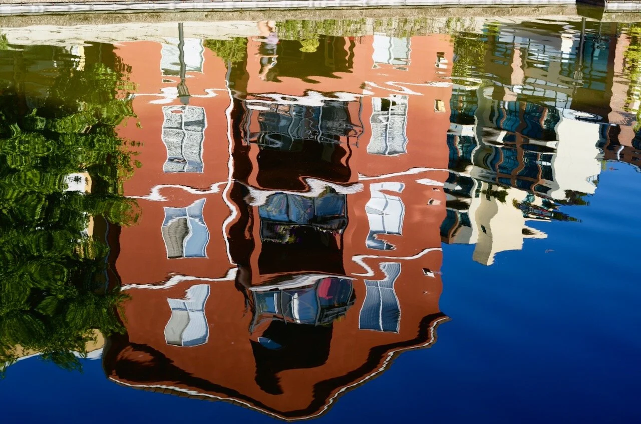 Condos reflected in lagoon, New Westminster B.C.Click image for lightbox.
