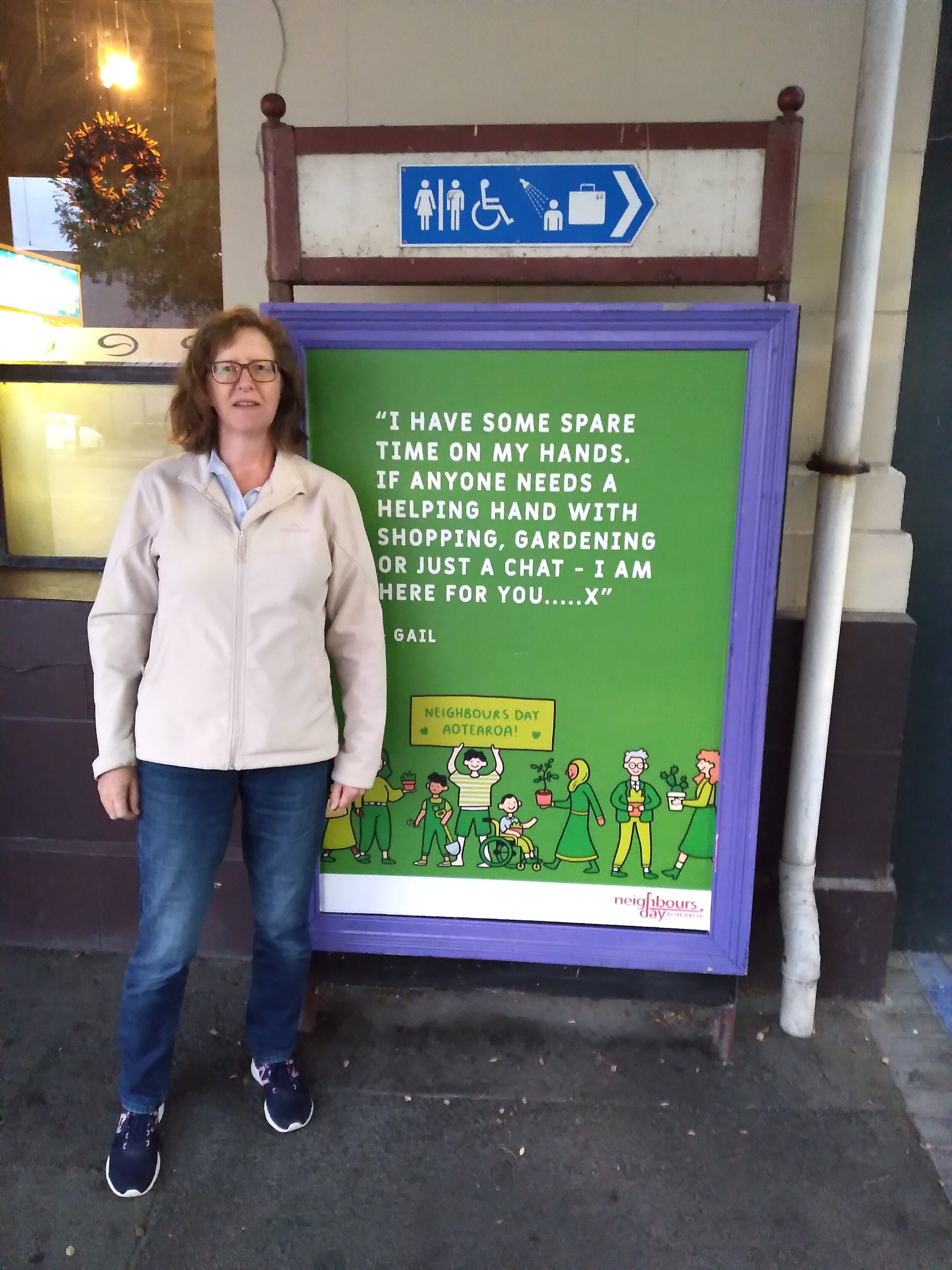 Here’s one of our Notes for neighbours winners, Tsana in front of Gail’s note to neighbours poster in Invercargill!