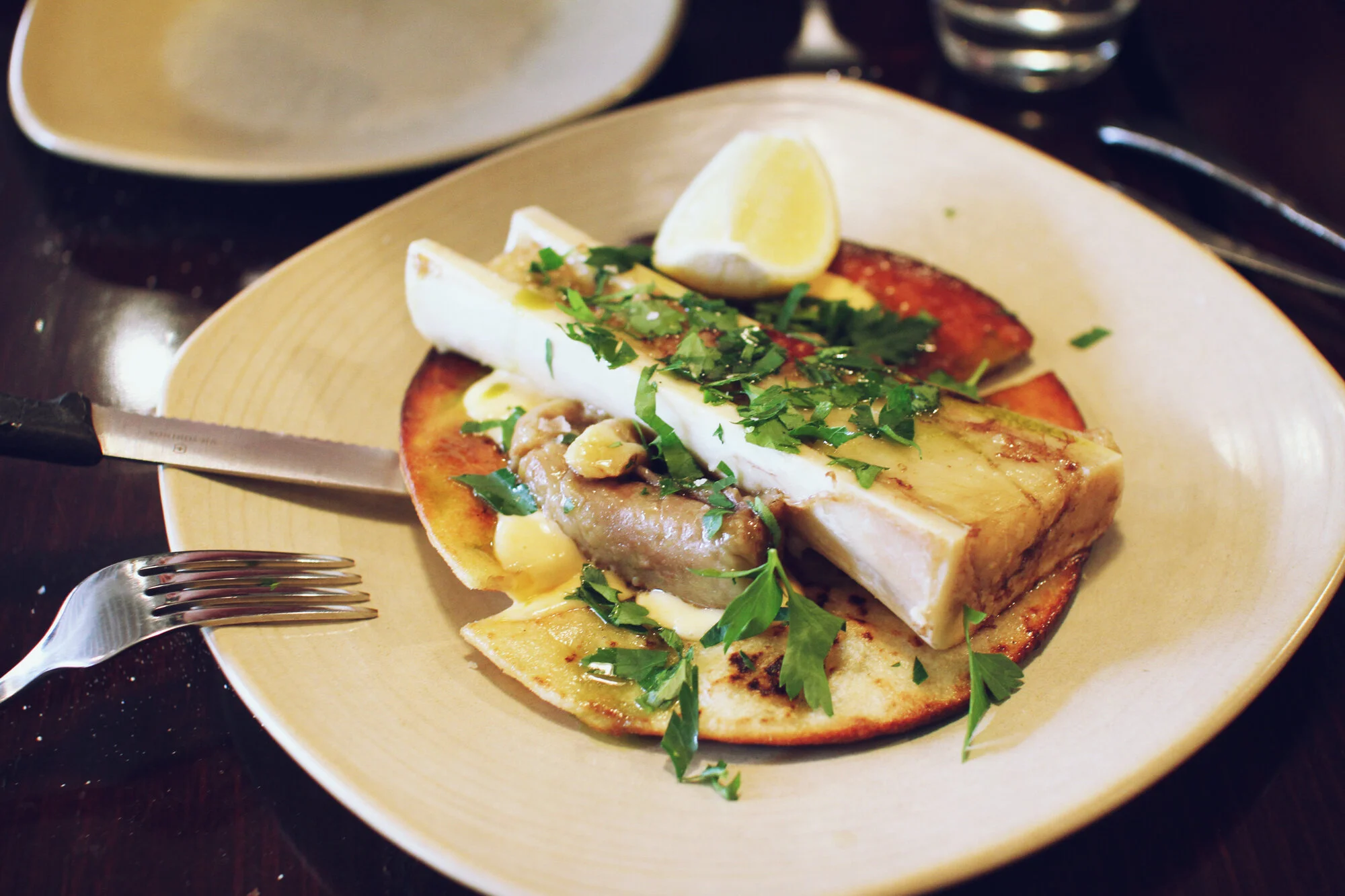 Roast Bone Marrow with fried flat bread and spicy mayo