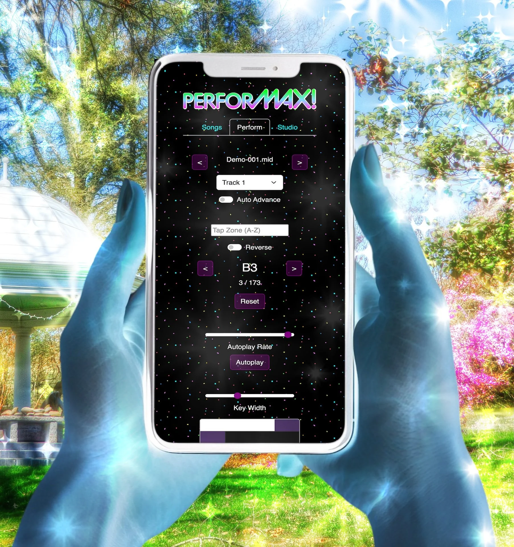 XUSIONE’s hybrid sampler app PerforMax is featured in an image showing a person holding a phone displaying the app. The background features a bright outdoor scene with trees, colorful blossoms, and a small white gazebo.