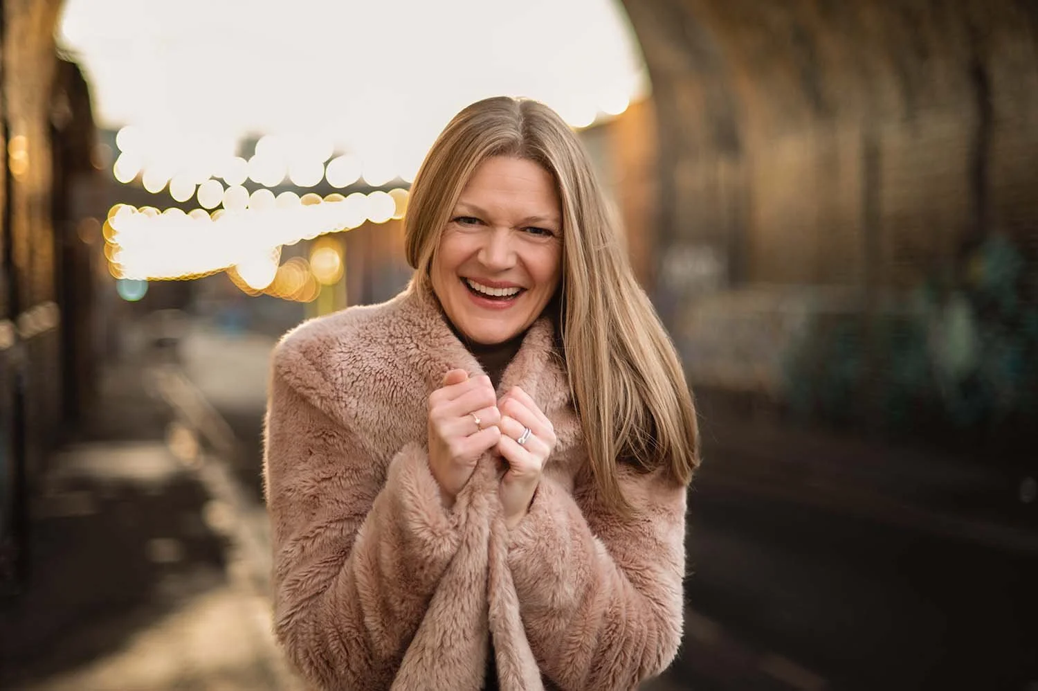 Recruitment Coach, Ellie Rich-Poole, photographer smiling in Digbeth by Victoria Beddoes