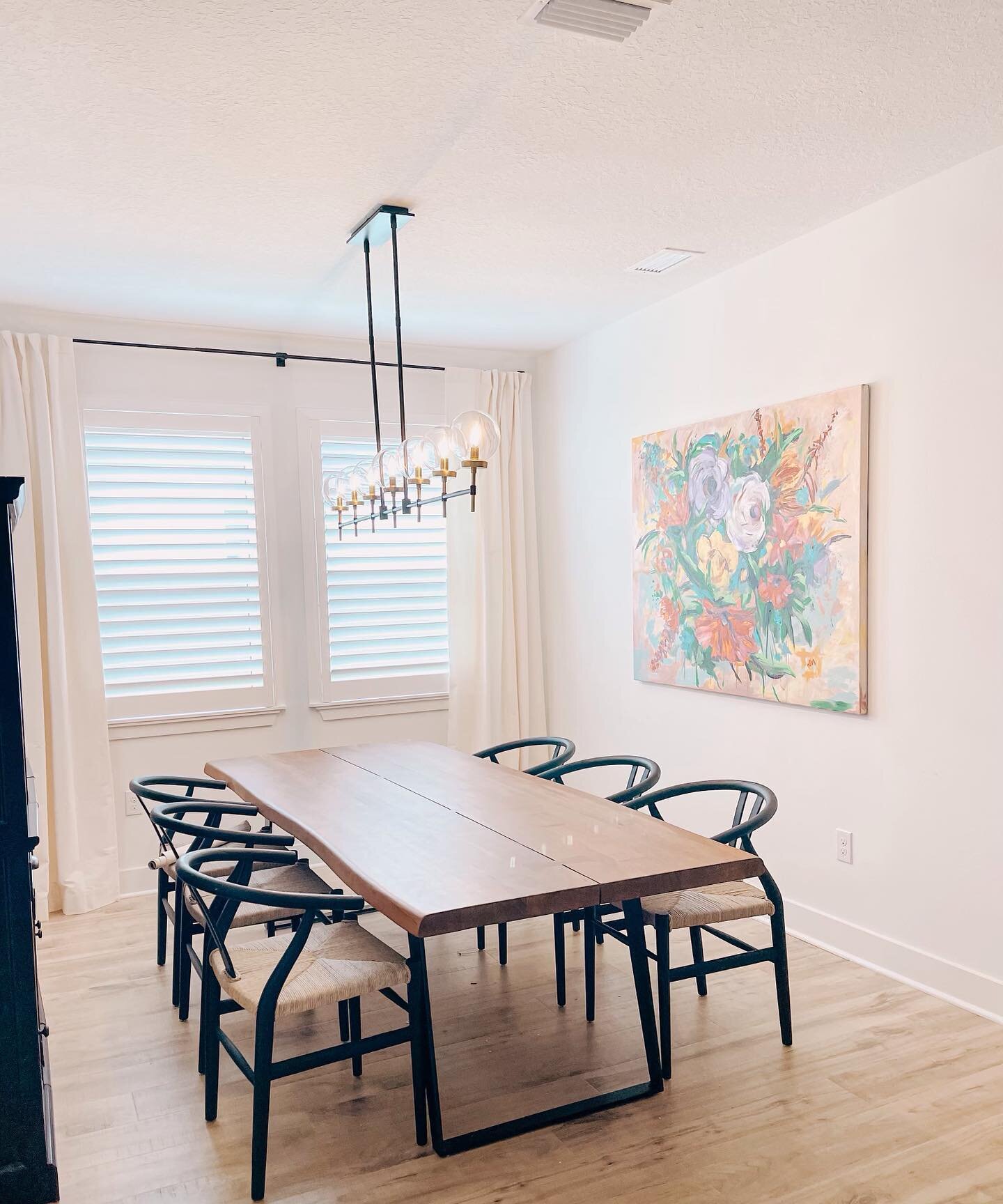 Two beautiful spaces made extra open and airy by using shutters as the window covering of choice. A true balance of form &amp; function. ⚖️ Can&rsquo;t you just picture the perfect Thanksgiving dinner in this dining room?! 🧡

Designed by Therese D.
