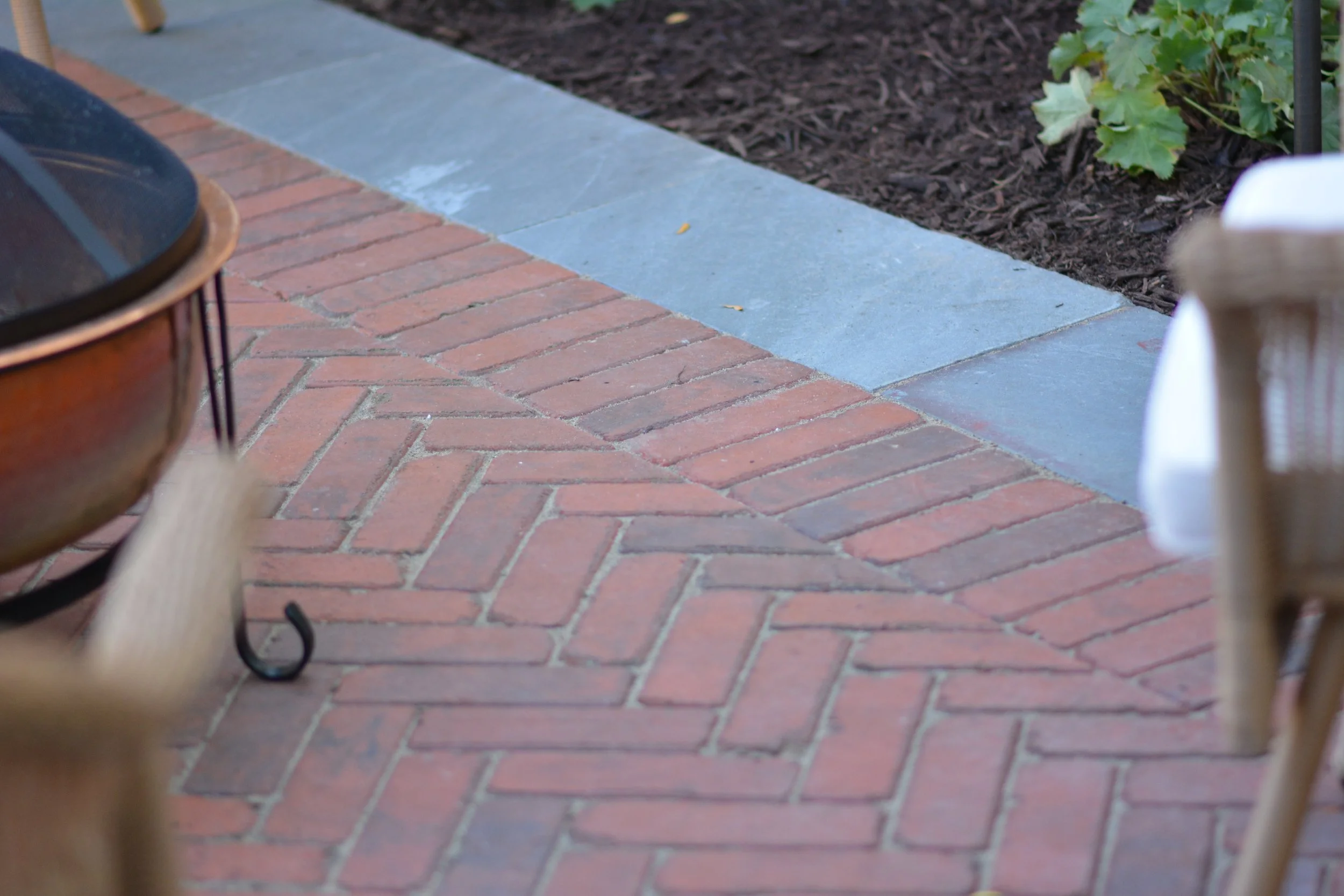 Our projects focus on executing quality hardscape and landscapes, including patios, outdoor fire pits, grilling areas, set walls, landscape lighting, pergolas, and drainage solutions.  We also offer full-service maintenance packages to keep your land