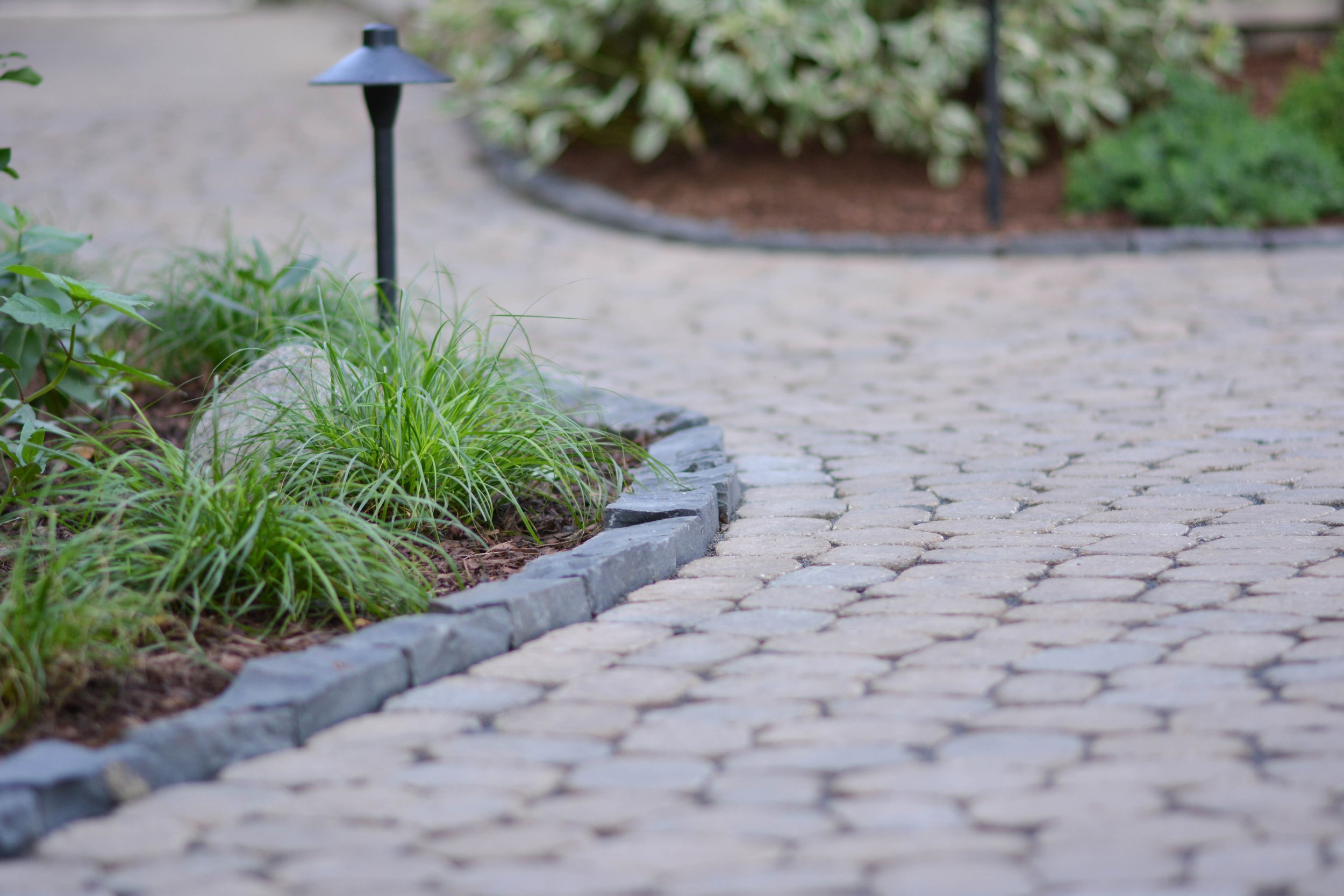 Our projects focus on executing quality hardscape and landscapes, including patios, outdoor fire pits, grilling areas, set walls, landscape lighting, pergolas, and drainage solutions.  We also offer full-service maintenance packages to keep your land